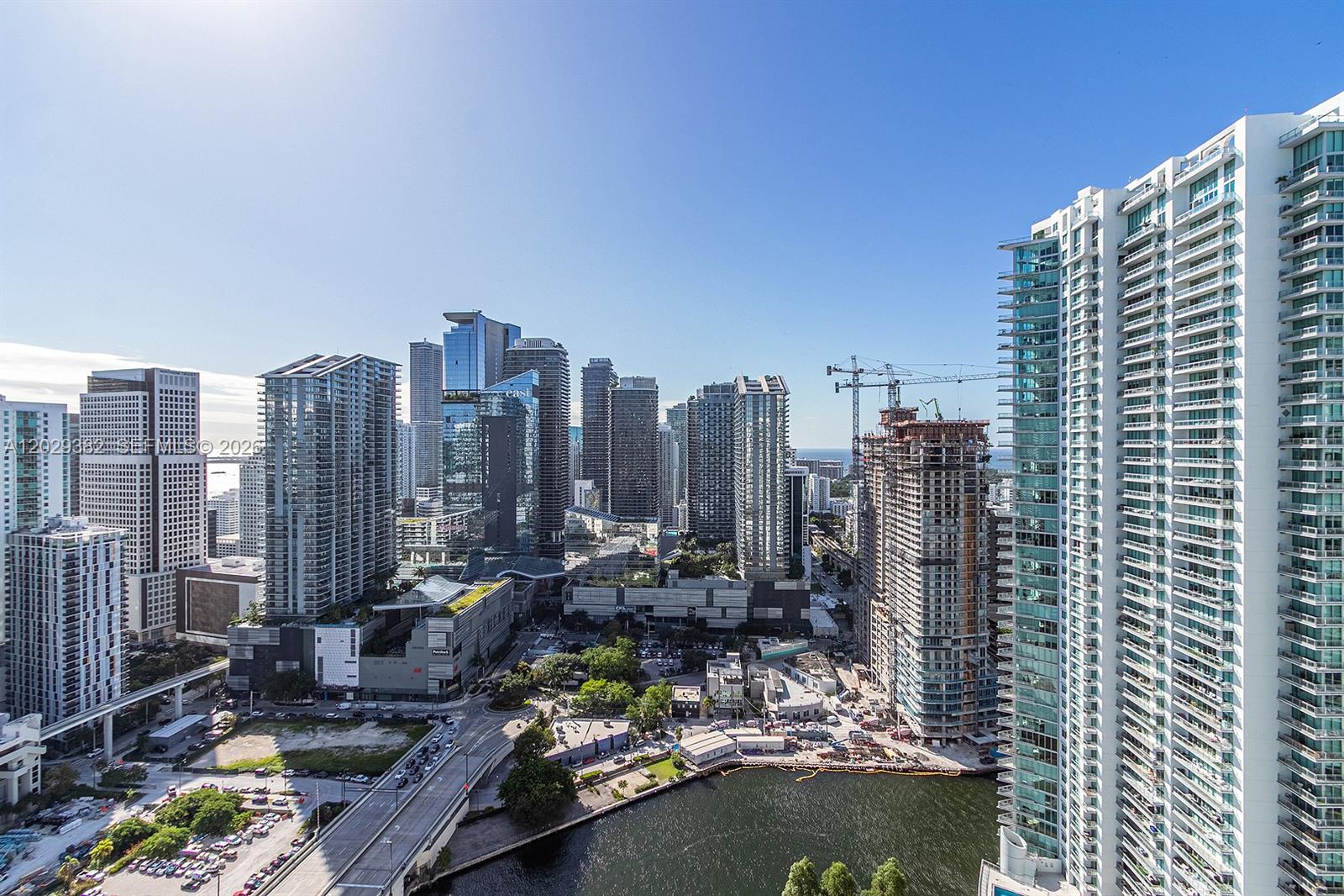 Spectacular Miami River and Brickell Skyline Views from this gorgeous 2BR/2BA on the 39th floor at The Wind! Bright and spacious unit with floor-to-ceiling glass windows overlooking Brickell. Modern kitchen with stainless steel appliances, granite counters and wood cabinets. Beautiful tile and vinyl flooring throughout. Ample master bedroom with walk-in closet. Washer/Dryer in the unit. Oversized balcony is perfect for entertaining or relaxing while you take in the sensational views. HOA Fee includes cable, internet, water and 1 parking space. The Wind offers resort style amenities including 24 hr concierge, valet, infinity pool, two story gym, steam room, sauna, racquetball, yoga room and more. Steps away from Brickell City Centre, top restaurants, shops, nightlife and the Metromover.