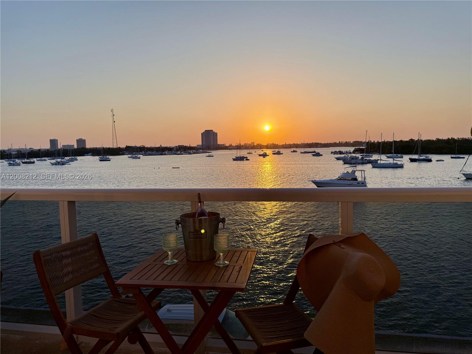 HOA just reduced! Assessment fully paid! Move right in and enjoy a lifestyle of effortless comfort. Waterfront living at its finest in this pristine 1/1 in Harbor Island, North Bay Village. Stunning west-facing views stretch over Pelican Harbor to the Downtown Miami skyline. This meticulously kept unit is filled with natural light all day. Generous living spaces & oversized bathroom. Bathroom upgraded with floor-to-ceiling marble tile. One of the few units featuring a full-size washer + dryer. Ample storage throughout, including a walk-in closet & deeded storage cage on the same floor. The Islander has been beautifully updated and has passed its 50-year re-certification, offering lasting value and peace of mind. Peaceful building with amenities such as gym, waterfront pool, lounge areas, new sunset deck, BBQs, guest parking, plus bike and kayak storage. Includes one deeded parking space.