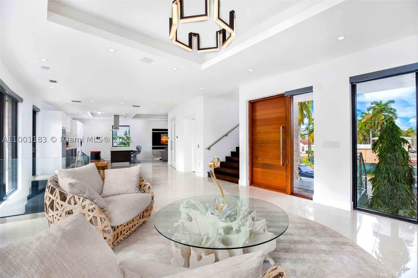 Brand new residence in prestigious Palm Island. Architect Reynaldo Burgess the home features a 3 story and open plan, 4 bedrooms, 4.5 bathrooms, living, dining, gourmet kitchen with top of the line appliances, family Room, 2 car garage, laundry, elevator and pool. Plentiful space for entertainment large groups, roof terrace with beautiful view of the ocean. High end finishes. Excellent location just minutes to South Beach and downtown Miami.