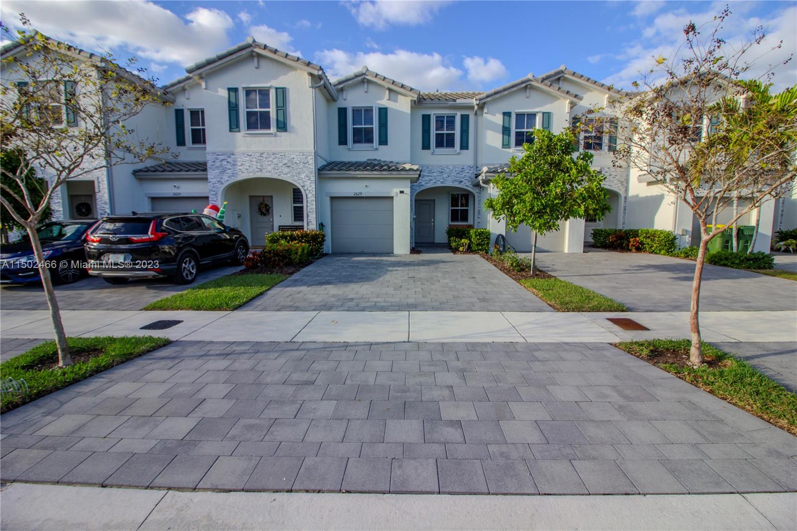 **PRICE REDUCED**Resort-style living. This beautiful upgraded townhome is exactly what your client is looking for; paved and fenced patio, chandelier lamp, tile flooring throughout the home, porcelain tile flooring in garage, plantation shutters in all windows and glass door patio entry, accordion storm shutters, kitchen sink & faucet upgrade, a beautiful tile backsplash & so much more. This property is completely gated with access to a Clubhouse with staff on site for all your community needs. Low HOA fees, close to Turnpike, Fl Keys, Shopping, Entertainment & more. Please refer to my photo gallery for pre-view. For showings please book on showingtime or call listing agent.