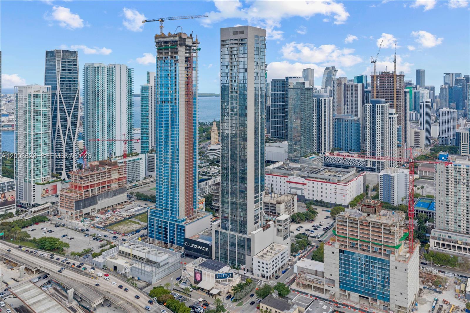 Welcome to one of the most iconic new towers to grace Downtown Miami, ideally positioned in the heart of Miami Worldcenter, one of America’s largest and most transformative urban developments. Surrounded by premier dining, luxury shopping, museums, sports, and entertainment, this location places you at the center of everything Miami has to offer.

Directly across from E11EVEN Miami and designed for an elevated lifestyle unlike anything else in the city, this landmark residence redefines luxury living. Residents enjoy world-class amenities including the Deepak Chopra Mind-Body Zone, rooftop dining by Riviera Dining Group, creators of MILA, sportsbook lounge, fitness center, resort-style pools, live entertainment, concierge, private beach club access, and nightclub privileges.

This open floor plan residence offers 2 bedrooms and 2 bathrooms with incredible views of Biscayne Bay, the Signature Bridge, and Downtown Miami skyline. Floor-to-ceiling glass fills the home with natural light and dramatic city and water views by day and night.

Features the highly desirable OS&E package with hotel program eligibility. Fully furnished with designer furnishings, elevated finishes, and turnkey details throughout.

An exceptional opportunity for personal enjoyment, short-term rental income, or long-term investment in one of Miami’s most dynamic destinations.