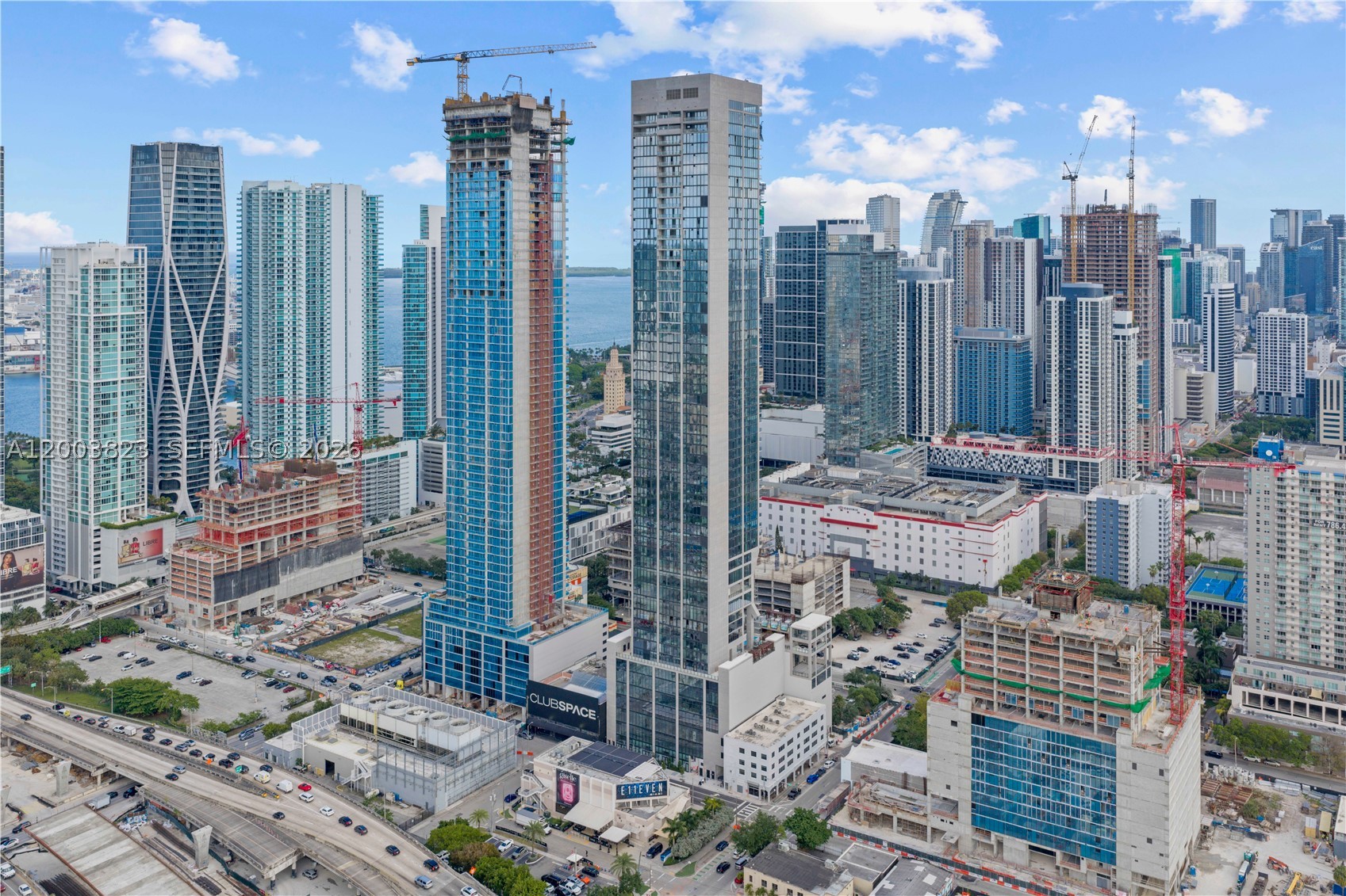 Welcome to one of the most iconic new towers to grace Downtown Miami, ideally positioned in the heart of Miami Worldcenter, one of America’s largest and most transformative urban developments. Surrounded by premier dining, luxury shopping, museums, sports, and entertainment, this location places you at the center of everything Miami has to offer.

Directly across from E11EVEN Miami and designed for an elevated lifestyle unlike anything else in the city, this landmark residence redefines luxury living. Residents enjoy world-class amenities including the Deepak Chopra Mind-Body Zone, rooftop dining by Riviera Dining Group, creators of MILA, sportsbook lounge, fitness center, resort-style pools, live entertainment, concierge, private beach club access, and nightclub privileges.

This open floor plan residence offers 2 bedrooms and 2 bathrooms with incredible views of Biscayne Bay, the Signature Bridge, and Downtown Miami skyline. Floor-to-ceiling glass fills the home with natural light and dramatic city and water views by day and night.

Features the highly desirable OS&E package with hotel program eligibility. Fully furnished with designer furnishings, elevated finishes, and turnkey details throughout.

An exceptional opportunity for personal enjoyment, short-term rental income, or long-term investment in one of Miami’s most dynamic destinations.