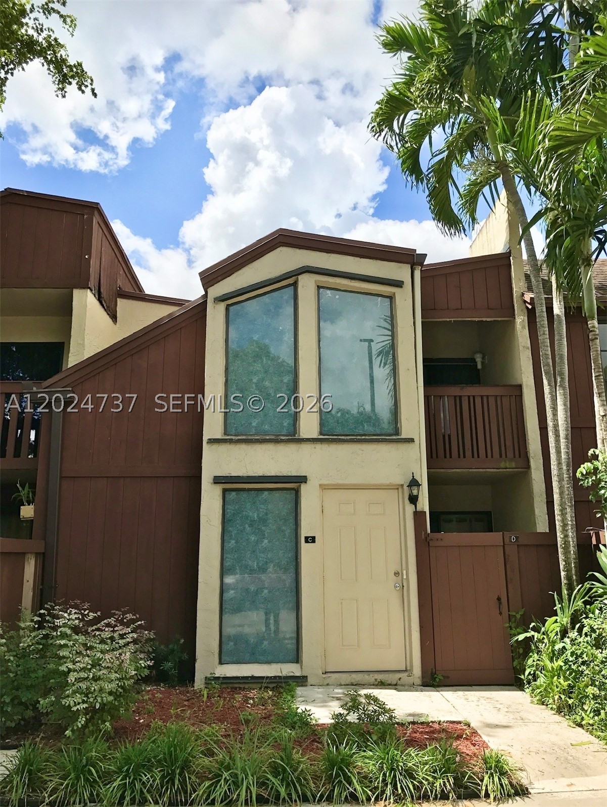 Welcome to Snapper Village living at its finest. This spacious 3-bedroom, 2-bath two-story residence offers the perfect blend of comfort, style, and convenience in one of Kendall's most sough-after private gated communities. Enjoy living on the largest floor-plan in the entire community featuring 1,550 square feet of living space. 
Charming architectural details include Saltillo tile flooring, exposed cedar beam high ceilings, split-bedroom layout, walk-in closets, and both front and rear balconies (master bedroom).
Residents in this highly desirable community enjoy resort-style amenities including a guard-gated entrance, 5 star resort style pool, tennis courts, walking trails, playgrounds, clubhouse, beautifully landscaped grounds and much more. 
Centrally located immediately near the Florida Turnpike, and four shopping plazas within four blocks. A MUST SEE!