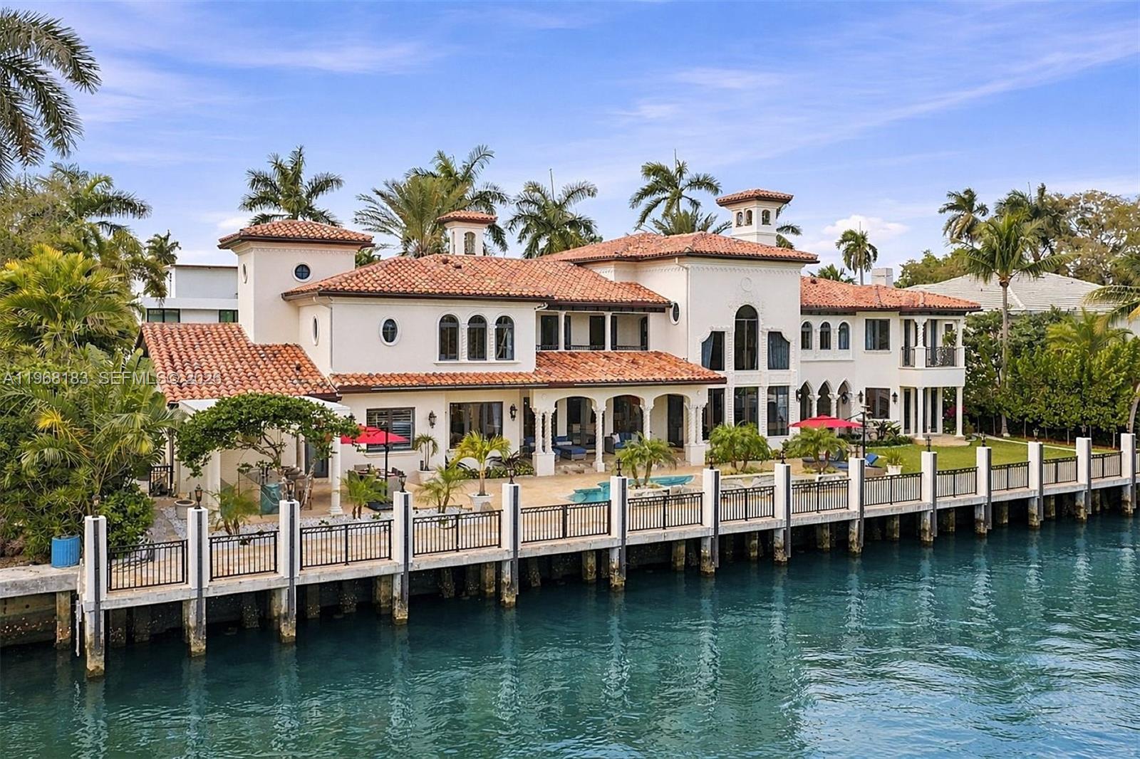 Exceptional Mediterranean waterfront estate offering over 15,000 sq ft of refined luxury, including 8,000+ sq ft under air and expansive indoor and outdoor living. Positioned on 150 ft of pristine Intracoastal frontage, the residence captures breathtaking water views and coastal breezes in a true resort-style setting.

Extensively renovated with meticulous attention to detail, the home showcases exquisite architectural craftsmanship. A dramatic handcrafted staircase, soaring ceilings, and abundant natural light create an elegant yet inviting atmosphere. Designed for elevated entertaining, the chef’s kitchen features striking all-backlit stone finishes, premium appliances, and a full catering kitchen adjacent to the formal dining area—ideal for both grand gatherings and intimate occasions.

The estate offers six spacious ensuite bedrooms, including two luxurious primary suites—one on each level—with private sitting areas. Additional highlights include four fireplaces, a private elevator, and thoughtfully designed living spaces throughout.

Outdoor living is exceptional, featuring a new extended waterfront deck, a new Gazebo, a resort-style pool and Jacuzzi, and a fully equipped outdoor kitchen. Located within walking distance to shops, dining, beaches, and nightlife, this residence blends timeless Mediterranean elegance with modern luxury in a premier waterfront location.
The owner is highly motivated to sell, and all serious offers will be considered.