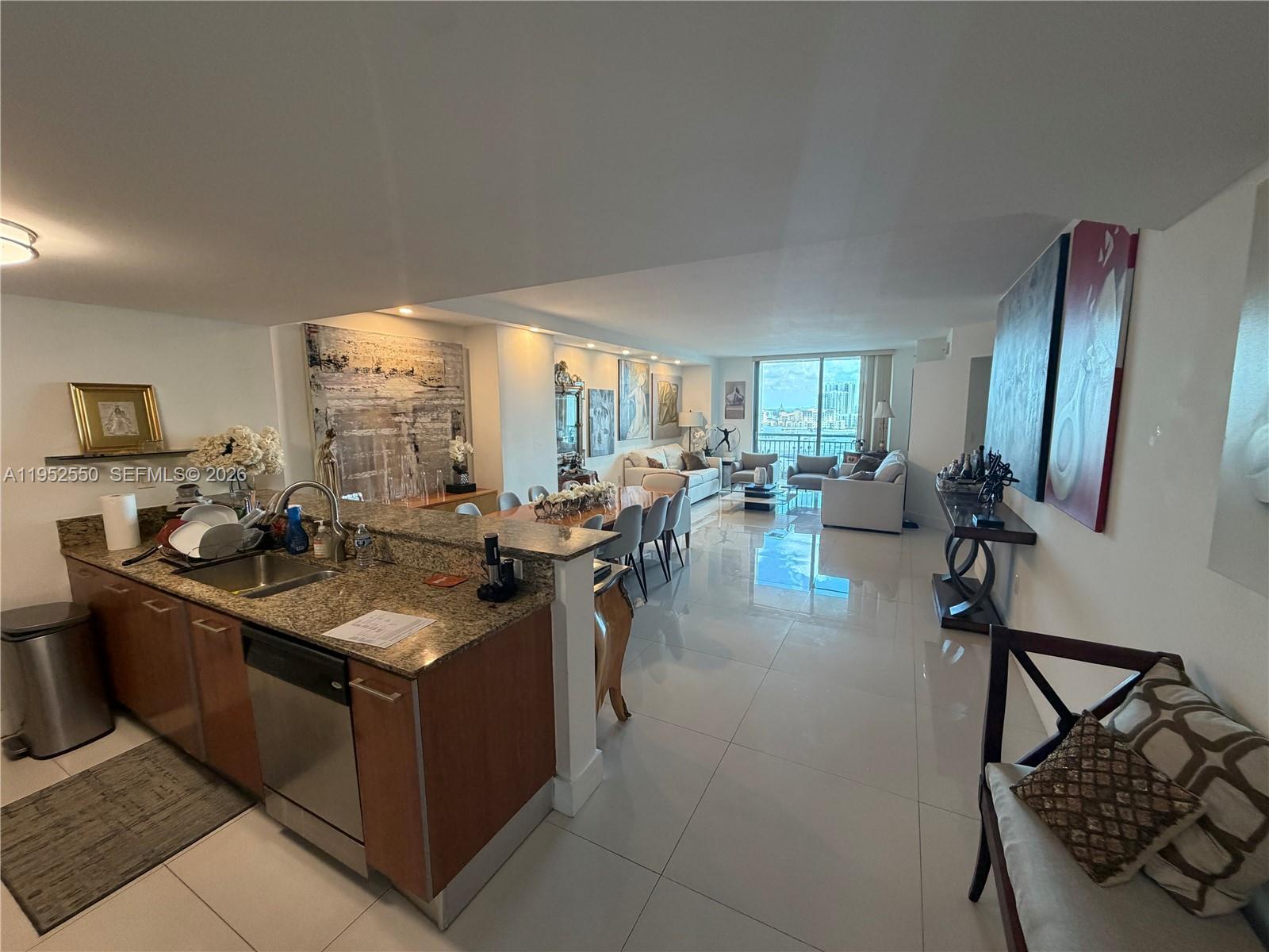 GREAT OPPORTUNITY...!!! FULLY REMODELED and beautifully maintained 2-BEDROOM plus DEN with walking closet,  2-bathroom, apartment located on the 11th floor at Metropolis in the heart of Downtown Dadeland. This bright and spacious residence features an open-concept layout with tile flooring throughout, a modernized kitchen with European-style cabinetry, stainless steel appliances, and granite countertops, along with fully updated bathrooms. Impact windows and doors provide comfort and peace of mind. Washer and dryer in unit. Includes one assigned garage parking space. Special Assessment will be paid by the Seller,

Enjoy resort-style living in a full-service building offering 24-hour concierge and valet services, pool, exercise room, and a clubroom for entertaining. The HOA includes wi-fi, cable tv, water. Exceptional walkable location just steps from Dadeland Mall, Metrorail, Publix, Trader Joe’s, restaurants, shopping, and entertainment.
