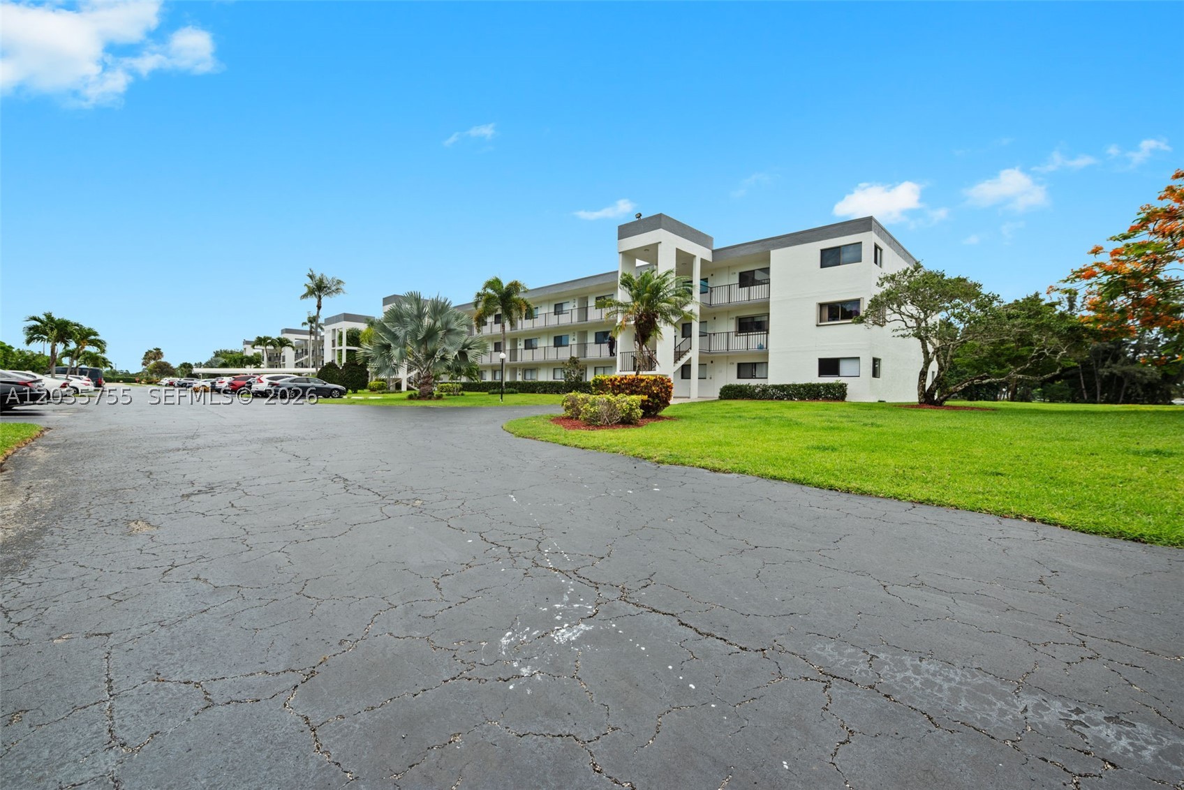 Enjoy peaceful lakefront living in this spacious and rarely available corner-unit 2-bedroom, 2-bathroom condo located in the highly sought-after 55+ gated community of Lakes of Delray. Offering 1,485 square feet of living space, this well-maintained second-floor residence features a desirable single-level layout with elevator access, abundant natural light, and beautiful lake views.

The generously sized kitchen offers ample cabinetry and workspace, while the primary suite features a private bath and abundant closet space. A dedicated in-unit laundry room with a full-size washer and dryer provides added convenience and storage. The spacious floor plan offers comfortable living areas and plenty of room to entertain family and friends.

Lakes of Delray is known for its active lifestyle and exceptional amenities, including a clubhouse, fitness center, swimming pools, tennis courts, pickleball, shuffleboard, billiards, library, card rooms, and a full calendar of social activities and events. Ideally located just minutes from shopping, dining, medical facilities, major highways, and vibrant downtown Delray Beach.

Don't miss this opportunity to enjoy affordable resort-style living in one of Delray Beach's most desirable active adult communities. Lease restrictions apply; buyer to verify with association.