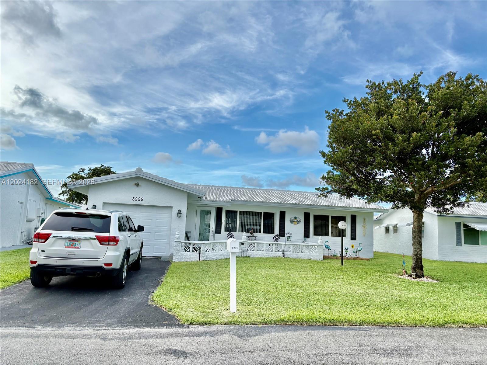Beautiful and spacious 2-bedroom, 2-bathroom home located in the highly desirable Lauderdale West community. Quick one minute walk to the clubhouse. Updated kitchen with quartz countertops, stainless steel appliances, washer and dryer. Both bathrooms updated. Vinyl floors and LED ceiling lighting throughout. Completely remodeled. Impact windows. 55+ community with low monthly fees which include exterior painting, lawn maintenance, roof repair and replacement, heated pool and spa, tennis, shuffleboard, pickleball, meeting rooms, craft room, workshop, exercise classes, fitness center and more. Courtesy transportation available. Sprinkler systems. and pest control included. Association requires at least 20% down payment if financing. Property sold AS IS with right to inspect.