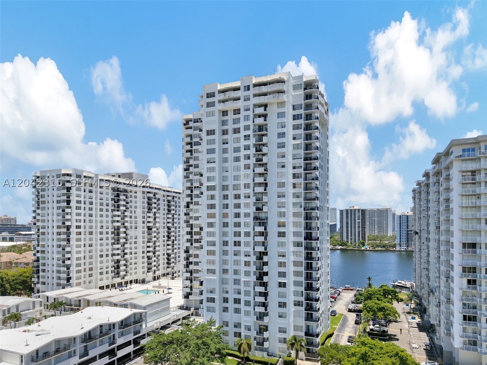 Stunning 2-bedroom, 2-bath residence in the heart of Aventura with breathtaking direct bay views and the iconic Sunny Isles skyline. Enjoy spectacular sunrises and an unbeatable waterfront lifestyle from your private balcony. This well-maintained building features a recently renovated lobby and elevators, along with resort-style amenities including a waterfront pool, tennis court, fitness center, and 24-hour security. Prime location just minutes from Aventura Mall, Sunny Isles Beach, fine dining, shopping, parks, and entertainment, with easy access to major highways. Experience the best of South Florida living in one of Aventura's most desirable locations. This apartment is located on the most desirable line in the building and is offered at the best price available. Don't miss this rare opportunity to own breathtaking million-dollar views at an exceptionally affordable price. Schedule your private showing today before it's gone!