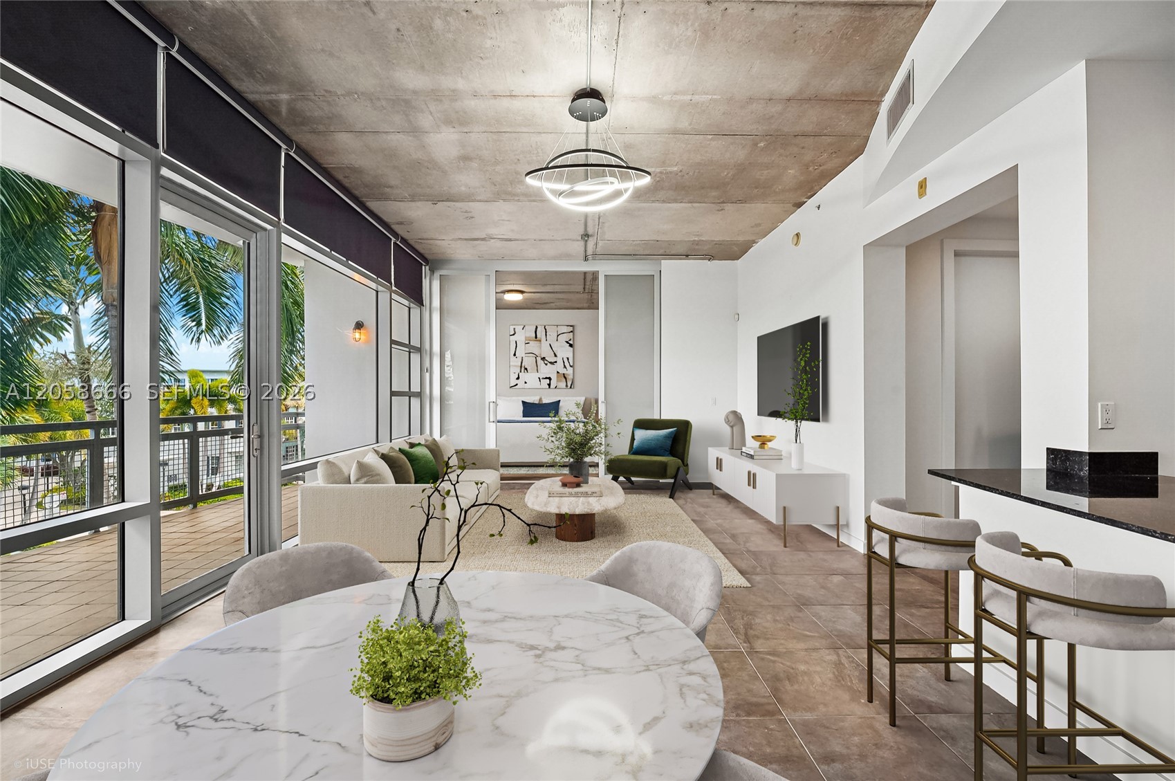 Incredible opportunity at The Meridian in Downtown Delray Beach. Modern, airy, and filled with natural light. This stunning 2bed/2.5 bath boasts an open floor plan with volume ceilings, fully operational sliding privacy doors/wall for each bedroom, floor-to-ceiling hurricane impact windows, separate laundry/pantry, oversized private balcony, heated rooftop pool, 2 parking spaces (one in garage) electric blinds, and large 5x10ft primary closet. The eat-in kitchen features granite counters, solid wood cabinets, and stainless steel smart appliances. Located three blocks from Atlantic Avenue's restaurants, boutique shops, and nightlife, three blocks to the Marina and a short ten-minute walk to Delray Beach.