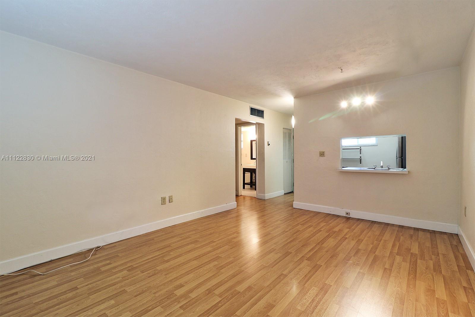 First floor 1/1 condo with laminate wood floors, stainless steel appliances, impact windows, newer A/C and water heater. Amazingly located in the Village of Pinecrest within walking distant to Dadeland mall, US-1, Metrorail station. Vacant and ready to move-in. Community is gated, offers pool, guest parking and laundry facilities. Unit comes with 1 assigned parking space.