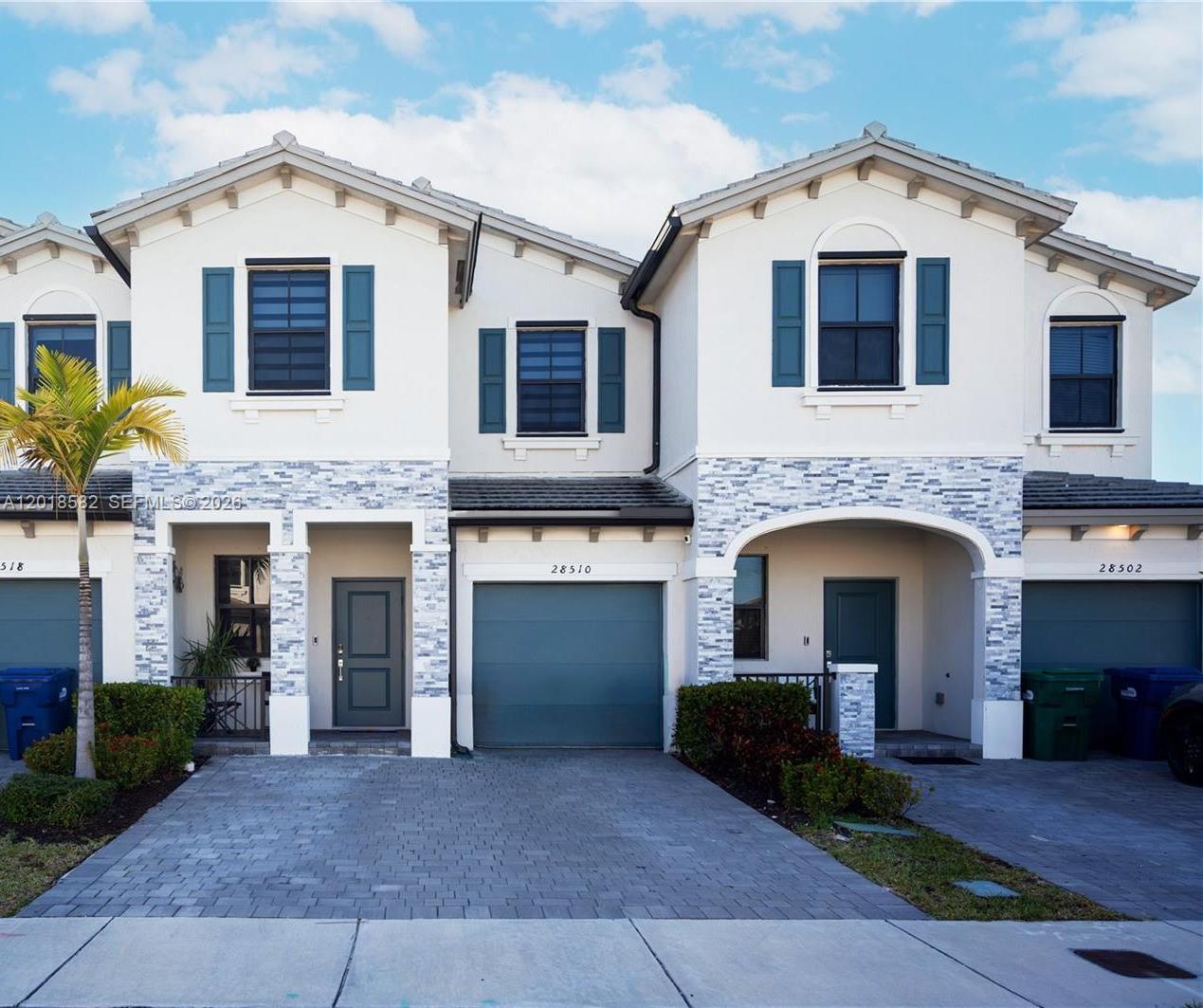 Welcome to this beautifully updated 4-bedroom, 2.5-bathroom townhouse located in the desirable Pine Vista community in Homestead. This spacious residence features an almost entirely remodeled interior with elegant vinyl flooring throughout, creating a modern look. The open layout provides comfortable living and dining areas, ideal for everyday living and entertaining. Step outside to a thoughtfully designed concrete patio featuring turf, whole-house water filtration system and decorative stone elements, offering a low-maintenance and stylish outdoor space. This property also includes access to community amenities such as a clubhouse, pool, fitness center, and landscaped common areas. Conveniently located near major roadways, shopping, dining, and recreational options. Move-in ready and designed with both comfort and functionality in mind.