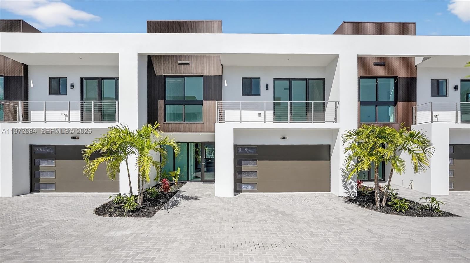 MOVE IN READY! Introducing H2O Dania, a newly delivered, gated townhome community in Dania Beach featuring just 11 modern residences with starting prices from $990,000. This boutique new construction development offers multiple layouts, contemporary architecture, and elevated finishes throughout. Four residences include deeded boat slips accommodating vessels up to approximately 32 feet, offering a rare opportunity for canal-front living. Photos are representative of available layouts and finishes within the community. Ideally positioned minutes from Fort Lauderdale Airport, beaches, marinas, Dania Pointe, major highways, and nearby places of worship. Limited inventory! Private, in-person tours available at the on-site sales center. SCHEDULE TODAY!