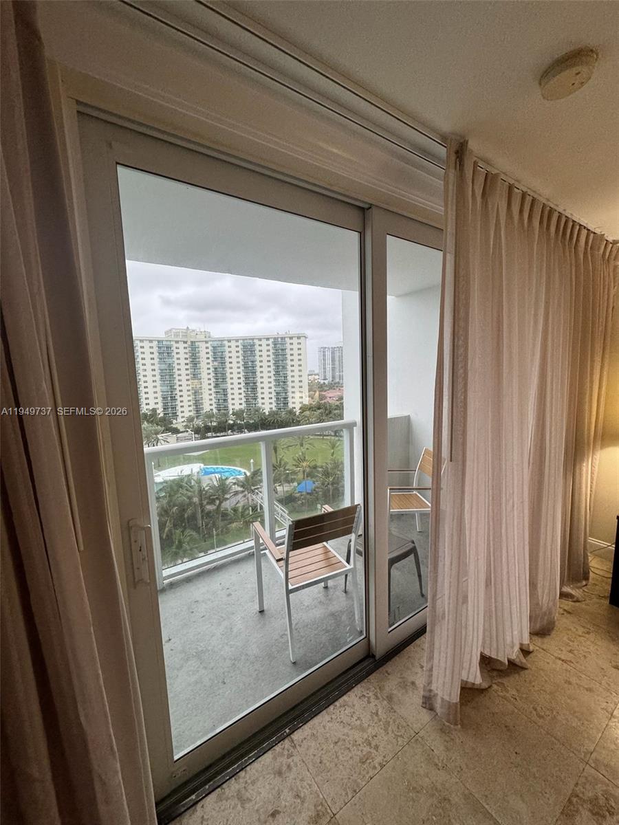 NEWLY REMODELED: NEW KITCHEN, NEW COOKTOP, NEW MICROWAVE, NEW FURNITURE, NEW SAMSUNG 65" TV, NEW VATITY, NEW SHOWER. OWNER FINANCING WITH 50% DOWN. UNIT WITH GLASS BALCONY. UNIT IS A RESIDENTIAL UNIT (ONLY 25% OF THE BUILDING), CAN BE USED AS A CONDO TO LIVE IN AND RENT IT WITH PARKING INCLUDED FOR A YEAR AND MORE. INTRACOASTAL AND CITY VIEWS FROM THIS OCEANFRONT STUDIO IN SUNNY ISLES. RENOVATED, TILED THROUGHOUT, MODERN FURNISHINGS AND UPDATED BATH! MAINTENANCE INCLUDES ALL: ELECTRIC, CABLE, INSURANCE, VALET PARKING, 24 HOUR SECURITY, WIFI, CABLE, WATER AND MORE. NEW IMPACT WINDOWS.