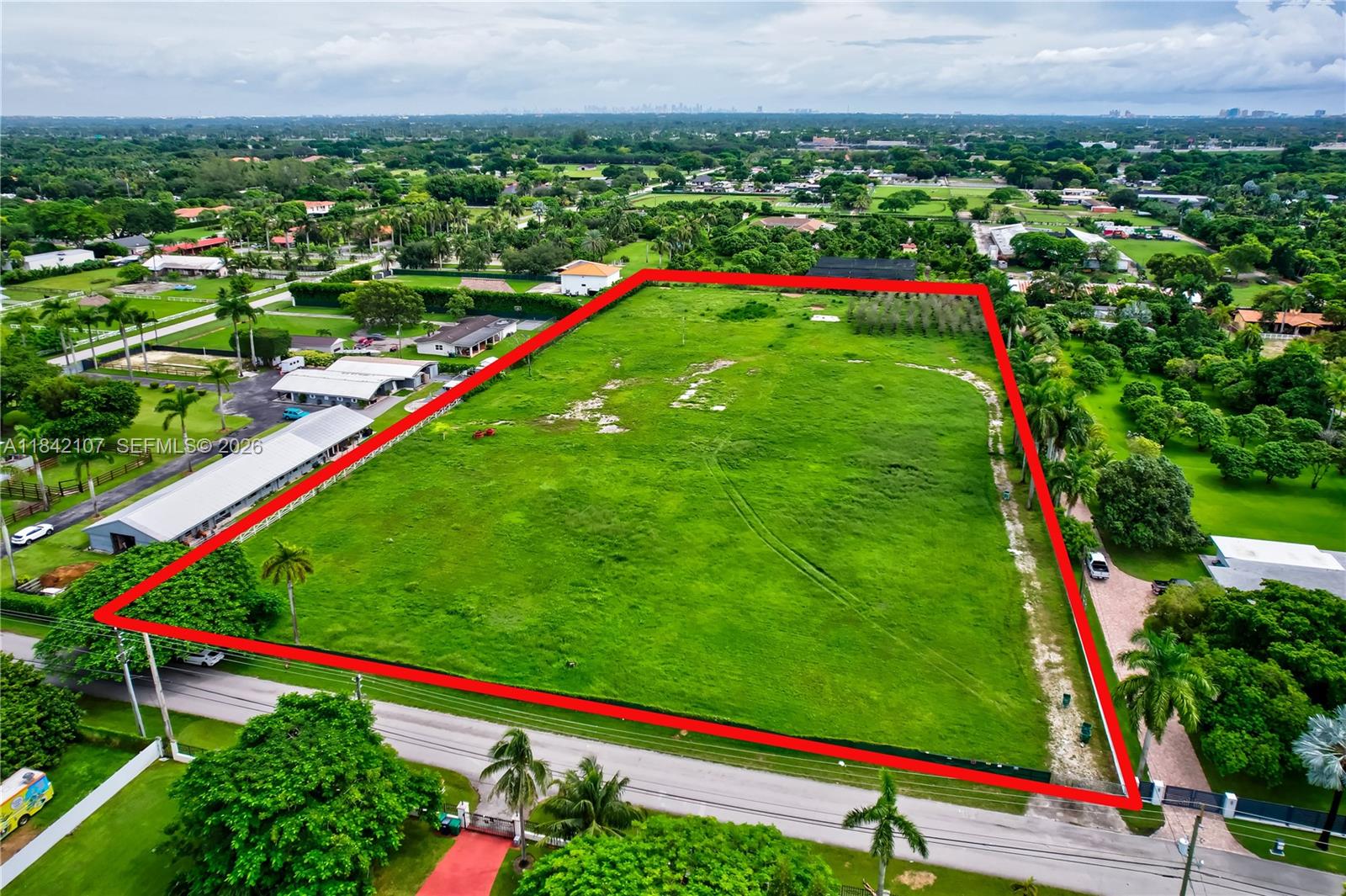 Introducing a fantastic opportunity to build your dream home on a stunning 4.87-acre lot in the heart of horse country. This property is located on one of the most desirable streets in the area and offers an exciting opportunity for those seeking to build their dream home. It is vacant/clean and is a perfect blank sheet to begin creating what you have always imagined! Architectural drawings designed by a well-known architect are available. These drawings consist of a gorgeous 5-bedroom house with pool, cabana, a two-car garage, and a state-of-the-art equestrian barn with 24 stalls, multiple rings, and grooms' quarters. Enjoy tranquil living, while still being conveniently close to schools, parks, and major highways! Take advantage of the agricultural tax exemption!
