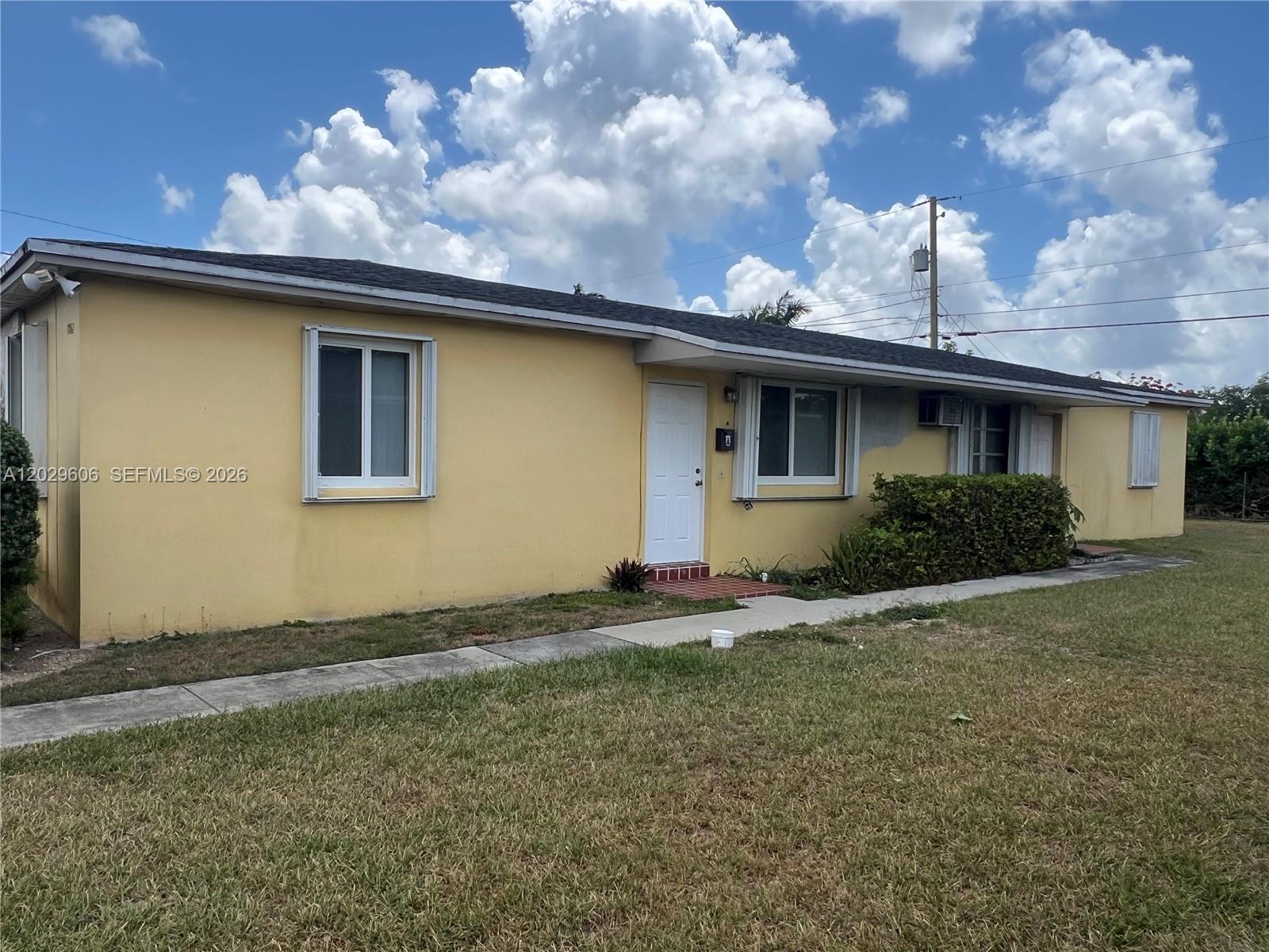 2 bedroom 1 bath duplex located in a great neighborhood. Large living room, eat in kitchen,  All new wood laminated flooring throughout. Washer and dryer hook up . Front and back porch. 1 assigned parking right in front of your unit and parking available for another car in the lot Nextdoor. Central AC unit, hurricane impact windows. Bathroom was completely updated with new tile, new toilet and new cabinet  1 year ago. Vertical blinds throughout.