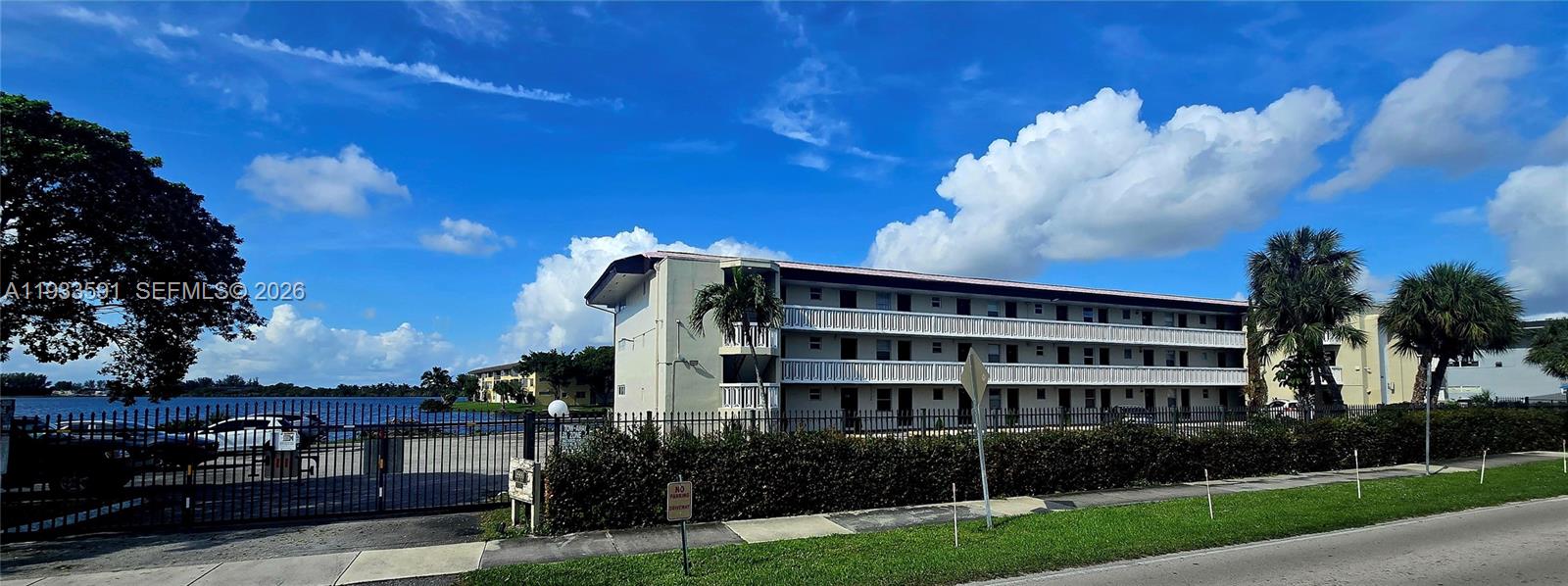Well-maintained one-bedroom lakefront condo in a gated North Miami Beach community, offering strong rental appeal and low monthly HOA fees. The unit features tranquil lake views from all main living areas, assigned parking, elevator access, and shared laundry facilities on each floor. Secure, quiet, and professionally maintained property with convenient access to major highways, shopping centers, and the beach. Ideal opportunity for investors seeking a low-maintenance asset in a high-demand location. Sold AS IS.