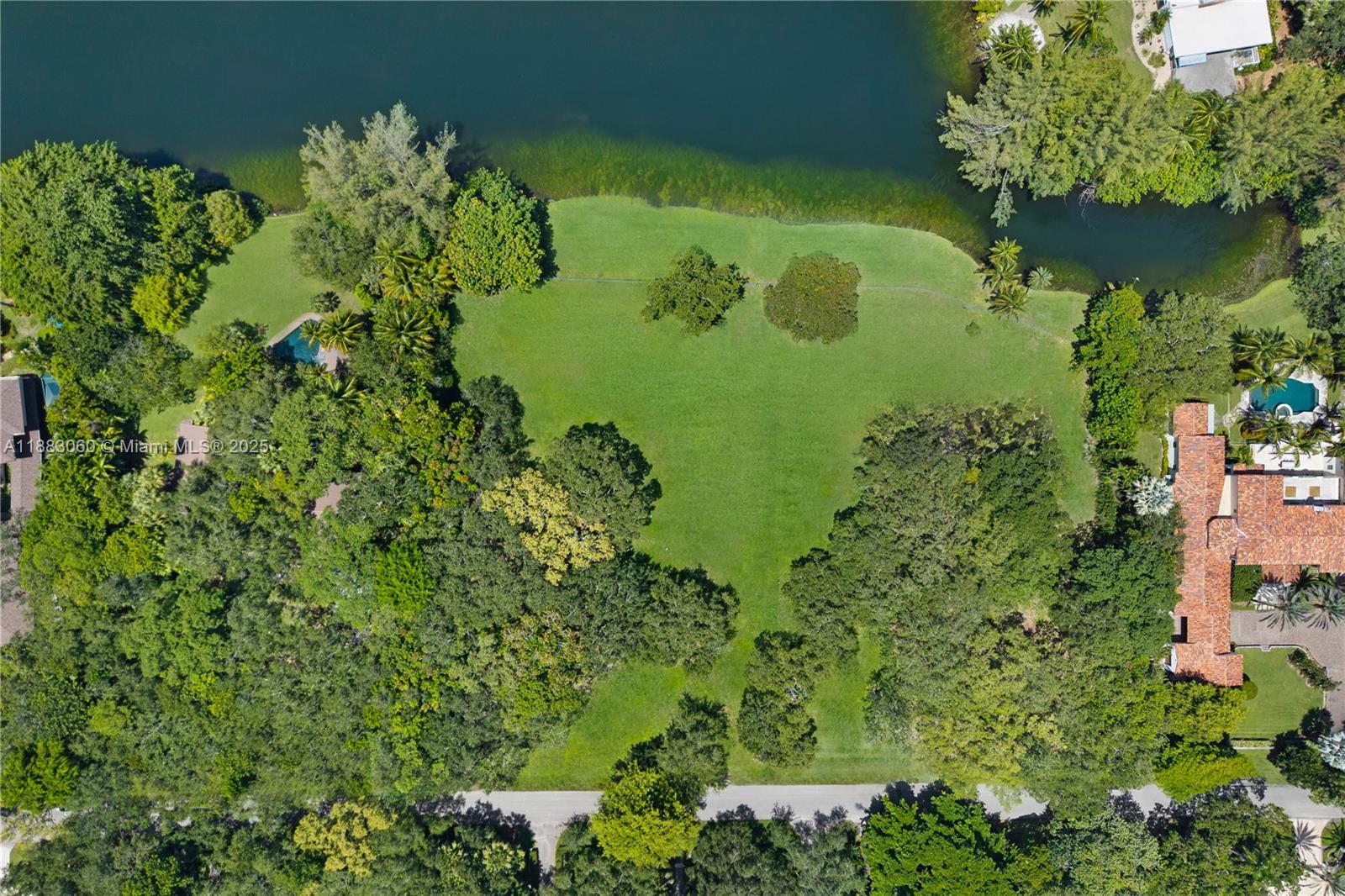 Rare opportunity to build your dream estate in Coral Gables’ exclusive guard-gated community of Snapper Creek Lakes. This expansive 57,499 SF lot (1.32 AC) offers unmatched potential with 200' of pristine lake-front, creating the perfect setting for a custom residence with sweeping lake views and resort-style amenities. Snapper Creek Lakes provides a serene, private lifestyle surrounded by mature landscaping and tree-lined streets, private marina, and 24/7 security. Minutes from top schools, dining, shopping, and cultural landmarks. A truly generational offering in one of Miami’s most prestigious neighborhoods. $100,000 non-refundable application fee to Snapper Creek Lakes Club required.