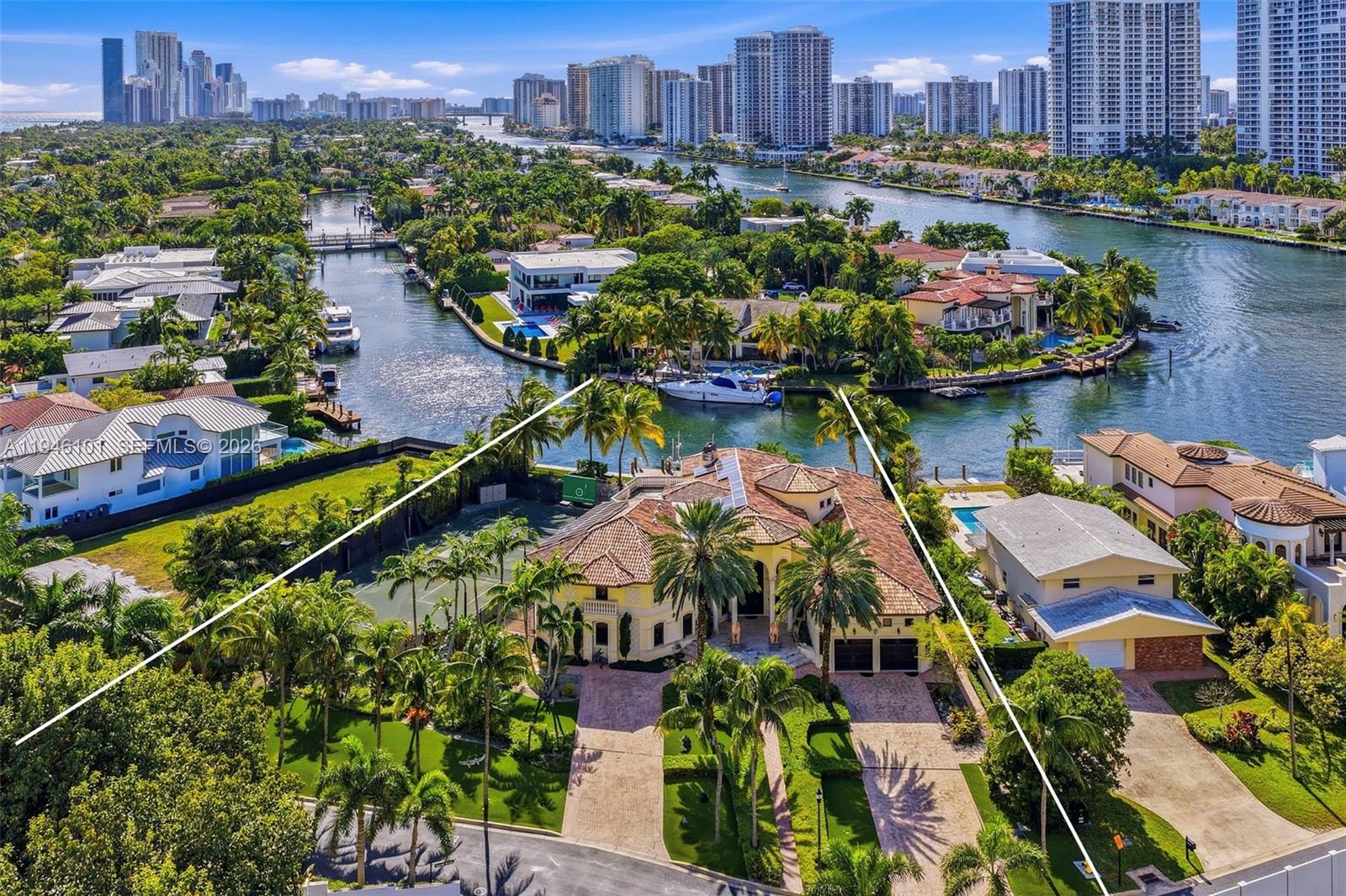 Welcome to 680 Golden Beach Drive, a true legacy estate set behind the world-famous gates of Golden Beach. Spanning nearly 29,000 sq ft, the property commands 135 ft of open, private water frontage and offers a rare, professionally built clay tennis court with night lighting. The nearly 9,000 sq ft residence is light, bold, and dramatic, defined by soaring ceilings and expansive living spaces that open to outrageously lush grounds. With a private beach, dedicated police department, and palm-lined sidewalks leading to neighborhood parks, this is not just a home - it’s an experience found in only a handful of places in the world.