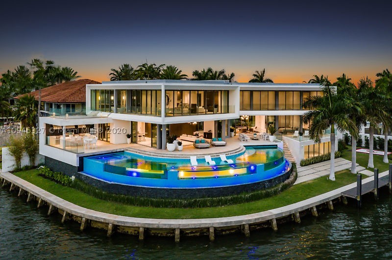FANTASTIC RARE OPPORTUNITY TO OWN A MANSION IN THE EXCLUSIVE GATED SANS SOUCI ISLAND. BREATHTAKING PANORAMIC WIDE BAY VIEWS. FEATURING 255 FT ON THE WATER. ULTRA MODERN 19,266 SF TOTAL NEW CONSTRUCTION JUST COMPLETED OCT/2020. EXCLUSIVE CURVE 102 FT LONG POOL WITH EXTERIOR VIEWS THROUGH 6 LARGE CURVE CLEAR GLASS PANELS. TOP OF THE LINE CONSTRUCTION AND FINISHES. WIDE WATER VIEWS FROM EVERY ROOM. *OWNER FINANCING AVAILABLE*
