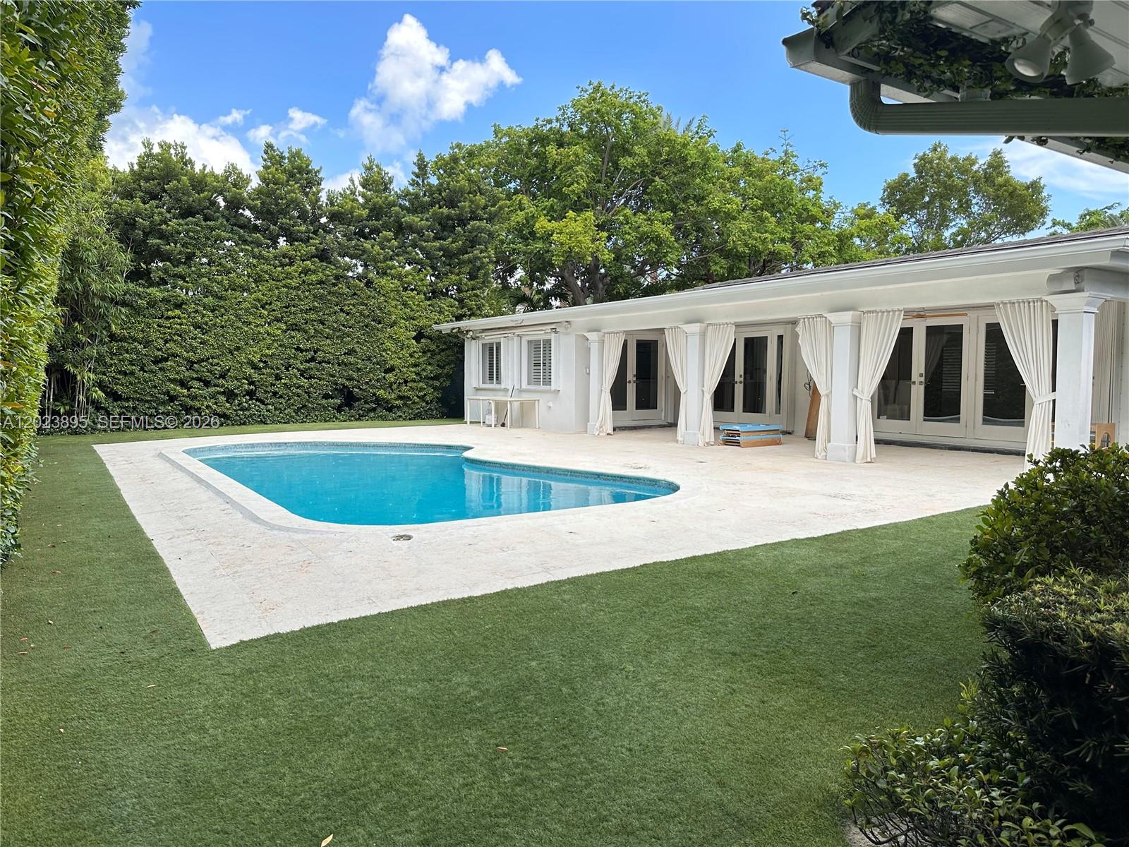Rare opportunity to live on prestigious Island Drive, considered one of the most beautiful and exclusive streets in Key Biscayne. This spacious one-story residence sits on an oversized 12,000 SF lot and offers approximately 3,498 SF of living area, 6 bedrooms, 5 bathrooms, and parking for up to 4 vehicles. Bright open layout with expansive living areas, lush landscaping, pool, and generous outdoor space ideal for entertaining and family living. Offered unfurnished and move-in ready July 20th.