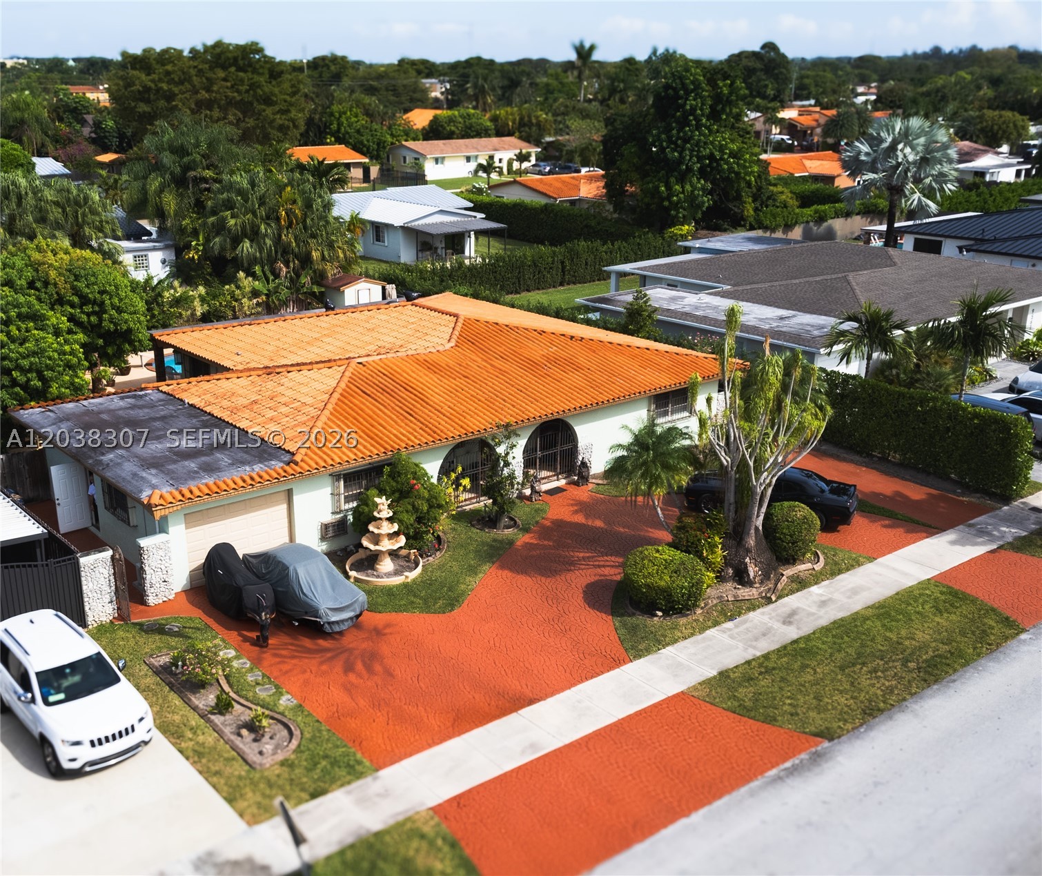 Seller Motivated! Exceptional Opportunity in Prime Sunset Location! See Virtual Tour link Attached! Discover the potential of this spacious single-family home nestled in one of Miami’s most desirable multi-million dollar neighborhoods, surrounded by luxury estates. Whether you're looking for a primary residence, a renovation project, or an income-producing investment, this property offers endless possibilities. The home features a paved circular driveway, a covered front porch with double-door entry, and a welcoming foyer with tile flooring throughout. The large kitchen includes wood cabinetry and stainless steel appliances, ready for your personal touch and updates. Step outside to a beautifully designed backyard ideal for entertaining, complete with a covered terrace overlooking the pool and a gazebo featuring a BBQ area, outdoor kitchen, and a full bathroom. A standout feature is the converted 1-car garage, currently set up as a private in-law suite with its own side entrance, offering 1 bedroom, living area, kitchenette, and full bath—perfect for rental income or extended family. Additional highlights include two storage sheds, a newer A/C system (less than 3 years old), and no HOA. Located near top-rated A+ schools, Baptist Hospital, major highways, shopping centers, parks, and dining. **Incredible value in a highly sought-after neighborhood—don’t miss this rare opportunity to create your dream home or investment property!**