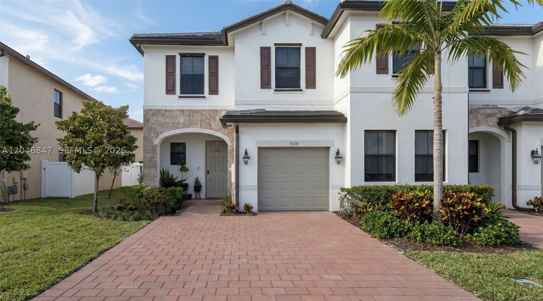 IDEAL FOR INVESTORS! Stunning 3-bed, 2.5-bath corner townhouse in Aquabella. Bright and spacious corner unit with beautiful lake view, featuring an open-concept kitchen with granite counters, stainless steel appliances, tile floors, walk-in closets, and a private fenced patio. Includes a 1-car garage plus parking for 2 more cars. Enjoy resort-style living with 2 clubhouses, pools, fitness center, splash pad, playgrounds, business center, pet area, and 24/7 gated security. Prime location near shops, dining, and major highways. Don’t miss it!