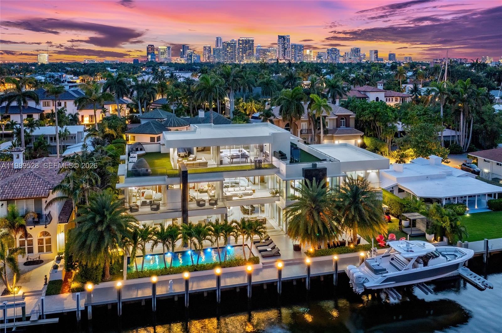 Positioned along 131 ft of prime deep-water frontage within Fort Lauderdale’s coveted Las Olas Isles, 650 Royal Plaza is a residence defined by scale, precision, and quiet grandeur. Set on a 15,720 sq ft lot along a wide canal with no fixed bridges, the property offers immediate ocean access and the ability to accommodate substantial vessels.

Spanning over 9,200 interior sq ft, the home unfolds with intention. Seven bedrooms, eight full bathrooms, and two bathrooms are thoughtfully distributed across a layout that balances openness with privacy. Voluminous living areas are framed by water views, while more intimate spaces offer a sense of retreat.

At the center, a sculptural Italian kitchen anchors the home, outfitted with Wolf and Sub-Zero appliances and designed as both a functional workspace and a visual statement. Multiple living areas transition seamlessly for both everyday living and entertaining.

The primary suite is conceived as a private sanctuary with spa-caliber finishes, oriented toward the water. Additional features include a fully integrated smart home system with Savant and Lutron controls, elevator access to all levels, multi-zone climate control, and a six-car garage.

A club level and rooftop terrace offer sweeping Intracoastal views and a setting that transitions effortlessly from day to evening.

Outdoors, a lap pool and spa sit along the water’s edge, framed by manicured landscaping, capturing a refined expression of South Florida waterfront living.