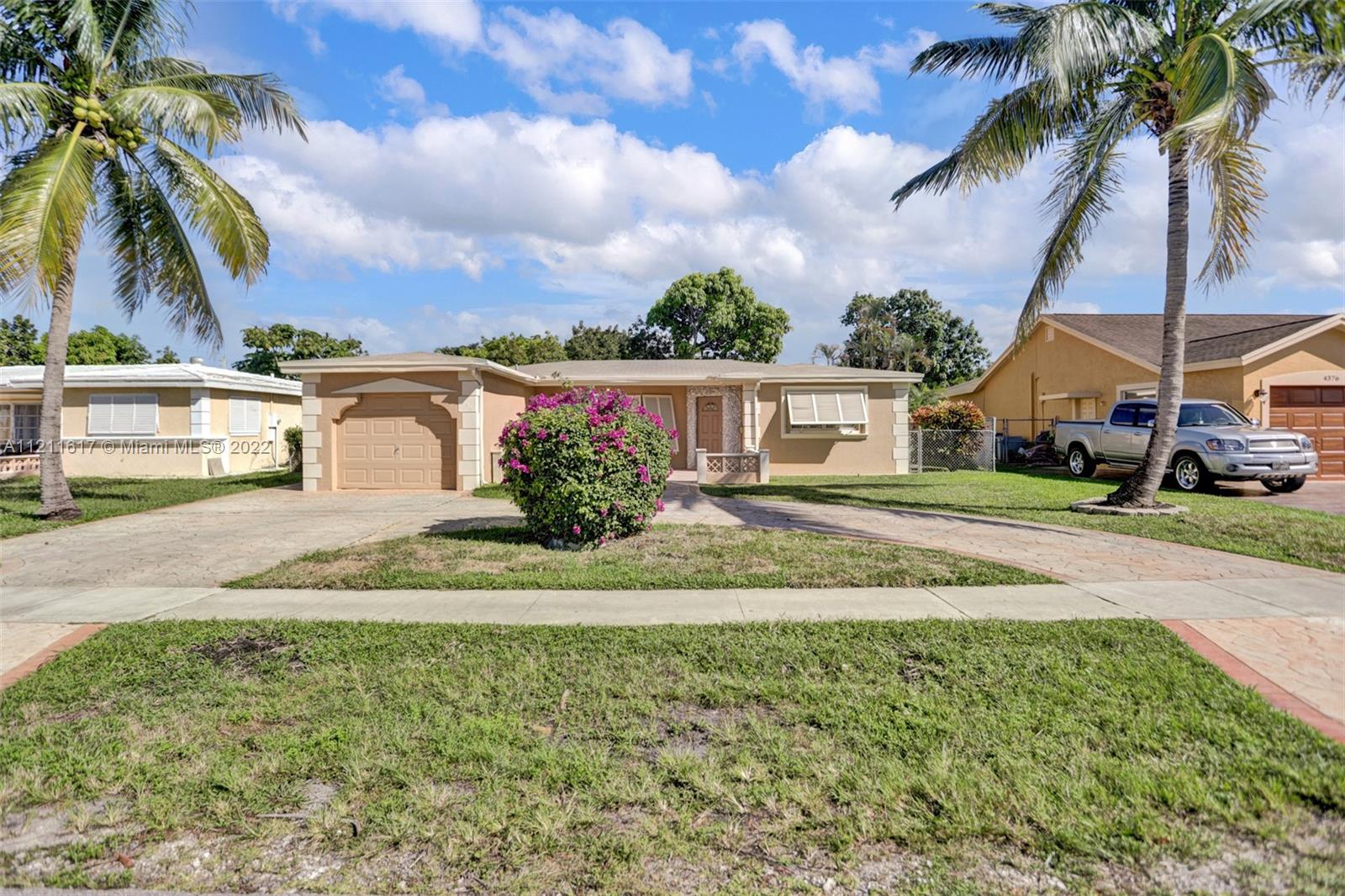 SPACIOUS SINGLE FAMILY HOME LOCATED IN A QUIET COMMUNITY IN THE HEART OF LAUDERDALE LAKES. IT IS A 2 BEDROOMS / 2.5 BATHROOMS HOME, BRAND NEW LAMINATE FLOORS IN BEDROOMS. THIS HOME FEATURES TILE AND WOOD FLOORS THROUGHOUT. THE KITCHEN IS EXTREMELY SPACIOUS WITH AN OVERSIZE DINING AREA OVERLOOKING THE BACKYARD & THE CANAL.