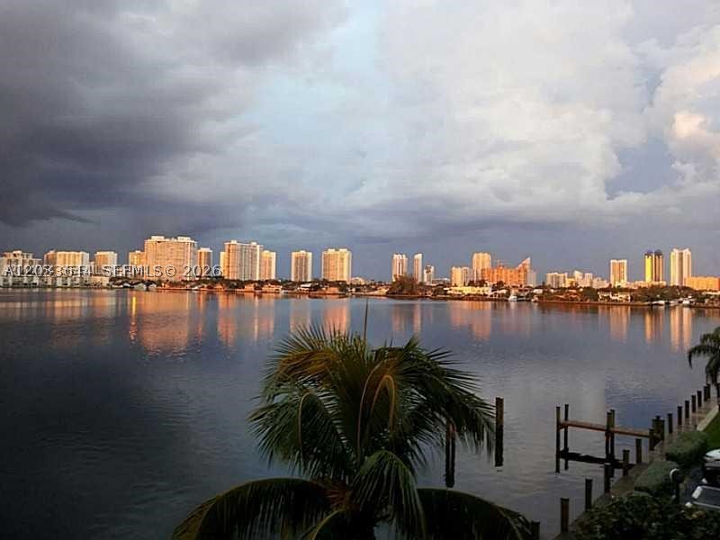 Bay views you have to see to believe! 2BED/2BA gem in North Miami Beach with impact windows + tennis court, pool, fitness center, club house and more.