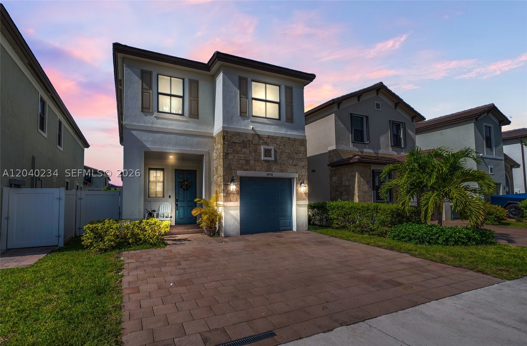 Beautiful 5-bedroom, 3-bathroom single-family home located in the highly desirable gated community of Aquabella in Hialeah. This spacious residence features an open-concept layout perfect for modern living and entertaining, with a convenient first-floor bedroom and full bath ideal for guests, in-laws, a nanny, or a home office. The kitchen offers ample cabinetry and counter space and flows seamlessly into the bright living and dining areas. Upstairs you'll find generously sized bedrooms, a comfortable primary suite, and a laundry room with washer and dryer conveniently located on the second floor. The property includes a 1-car garage and a driveway accommodating two additional vehicles. Residents enjoy resort-style amenities including two clubhouses, two swimming pools, a fitness center, children's water park, playgrounds, and parks. Conveniently located near excellent schools, shopping, dining, and major highways. A wonderful opportunity to enjoy comfort, space, and convenience in one of Hialeah's most sought-after communities.