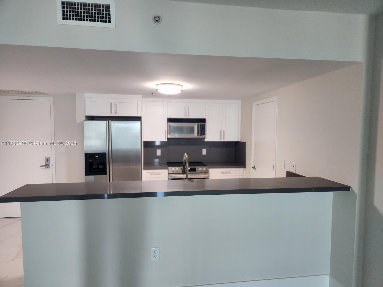 METROPOLIS II AT DADELAND - Residential Lease
