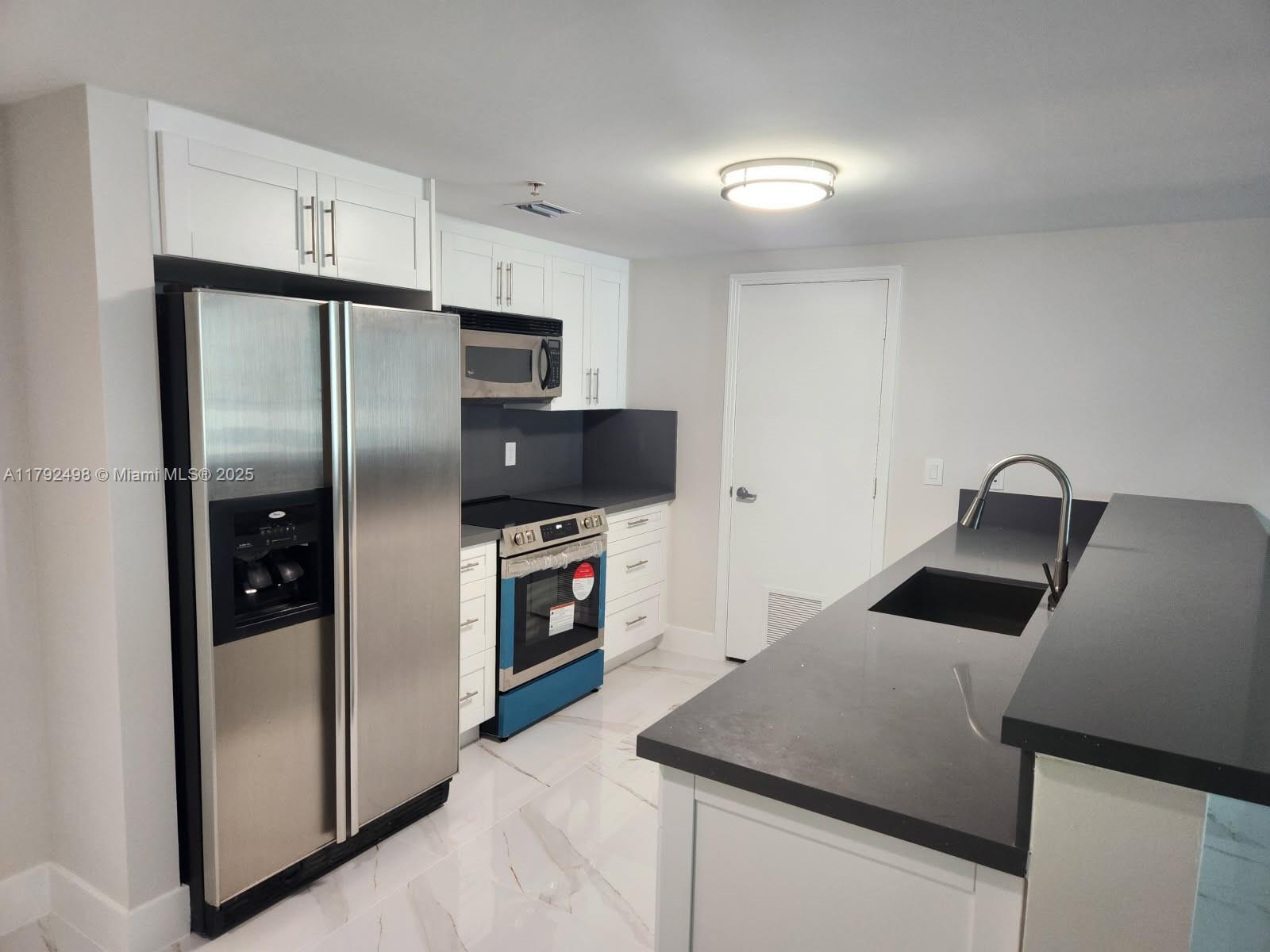 METROPOLIS II AT DADELAND - Residential Lease