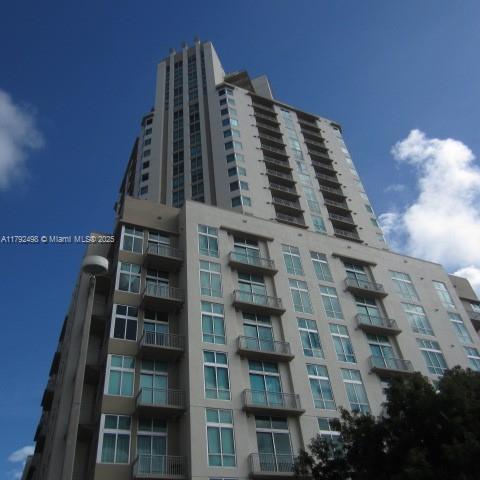 Be the first to occupy this updating Metropolis Condo. Renovations just completed.  New porcelain tile floors in all living areas including bathrooms.  New kitchen cabinets with granite counter tops, all ceilings and walls have been painted.  New stove and dishwasher.  Washer & dryer less than a year old.
