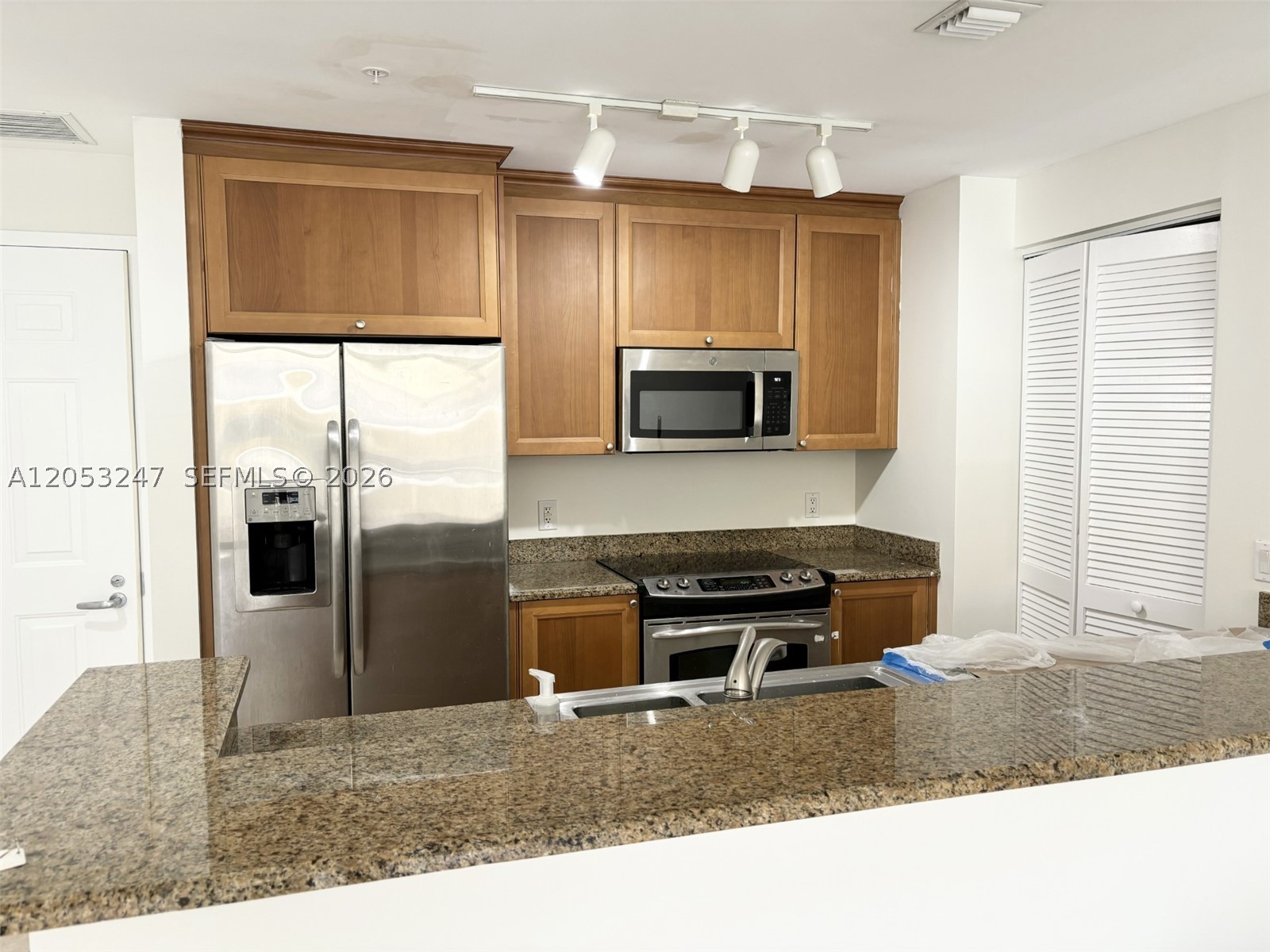 55 MERRICK CONDO - Residential Lease