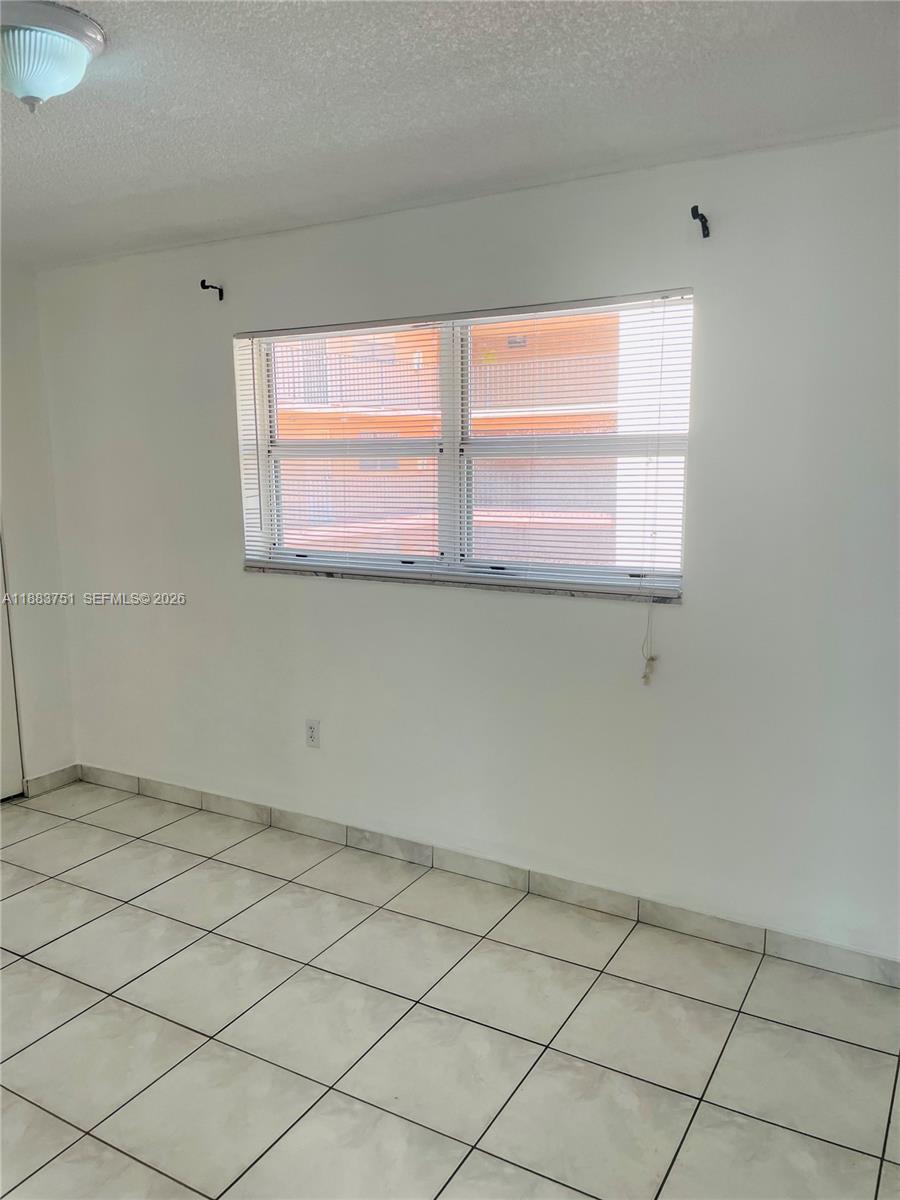 PALM-EAST GARDENS CONDO - Residential