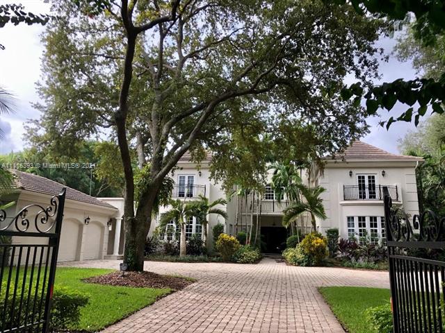 Elegant French Chateau architectural design on perhaps the most desirable street in coveted North Pinecrest. This spacious 7 bedroom 8 1/2 bath estate residence is situated on a near-acre of lushly landscaped grounds and provides approximately 11,000 square feet of home for your year-round enjoyment. Timeless beauty and a setting to match.