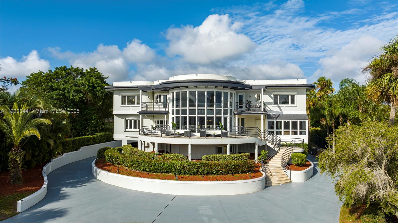 A rare gem on the prestigious South Indian River Drive, this stunning 10-bedroom, 9-bath waterfront estate offers 100 feet of direct Intracoastal frontage with sweeping sunrise views. Nestled on nearly 2.5 acres of lush, park-like grounds, the property captures the charm of Old Florida living with modern elegance. The main residence features soaring ceilings, spacious living areas, and refined finishes throughout, while a detached 2-bedroom guest house adds flexibility for family or guests. Enjoy your private pool, tennis court, and peaceful riverfront setting, luxury and tranquility combined.