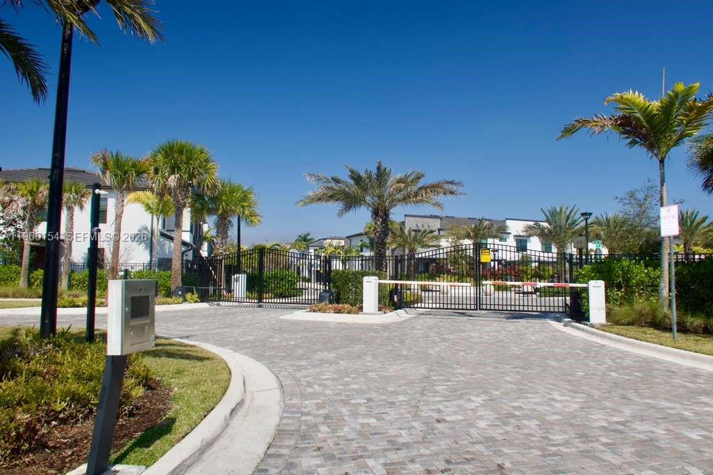 Beautiful new construction 3/2.5 townhouse featuring an open layout, upgraded kitchen and baths, modern finishes, floors, impact windows, and in-unit washer/dryer. Includes multiple upgrades and add-ons throughout. Convenient location near shopping, dining, and major roads. Has a charging station for electric vehicles.