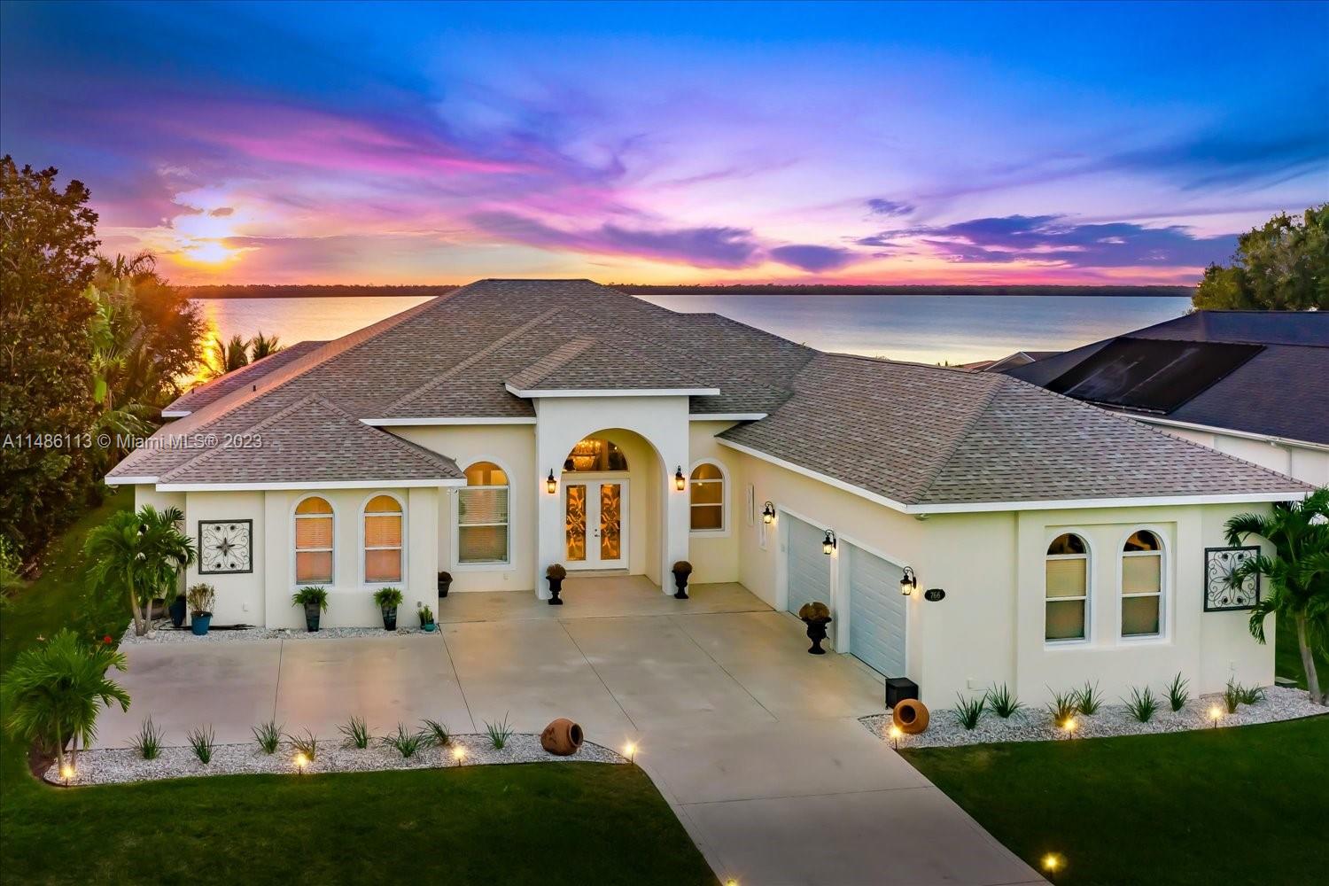 Stunning 4500 sf LUXURY WATERFRONT, POOL home in a gated community of upscale homes in Lake Placid Fl directly on the shores of 3500 ACRE Lake June with water views & sunsets that will take your breath away.Spend time with family &  friends as you gather in the extraordinary kitchen with 2 islands,imported marble counters,2 ovens,2 dishwashers & 2 sinks.Entertaining is easy with plenty of public space including family & living room that lead to the screened pool & patio with full view screening to enjoy the views!Enjoy movie night in the media room or take a walk out to your private boathouse for a day swimming or fishing on the lake!This home has it ALL with every upgrade you'd expect in a high end home & then some!Just a 2 hr drive from S Fl or either coast.LAKE LIFE is waiting for YOU!