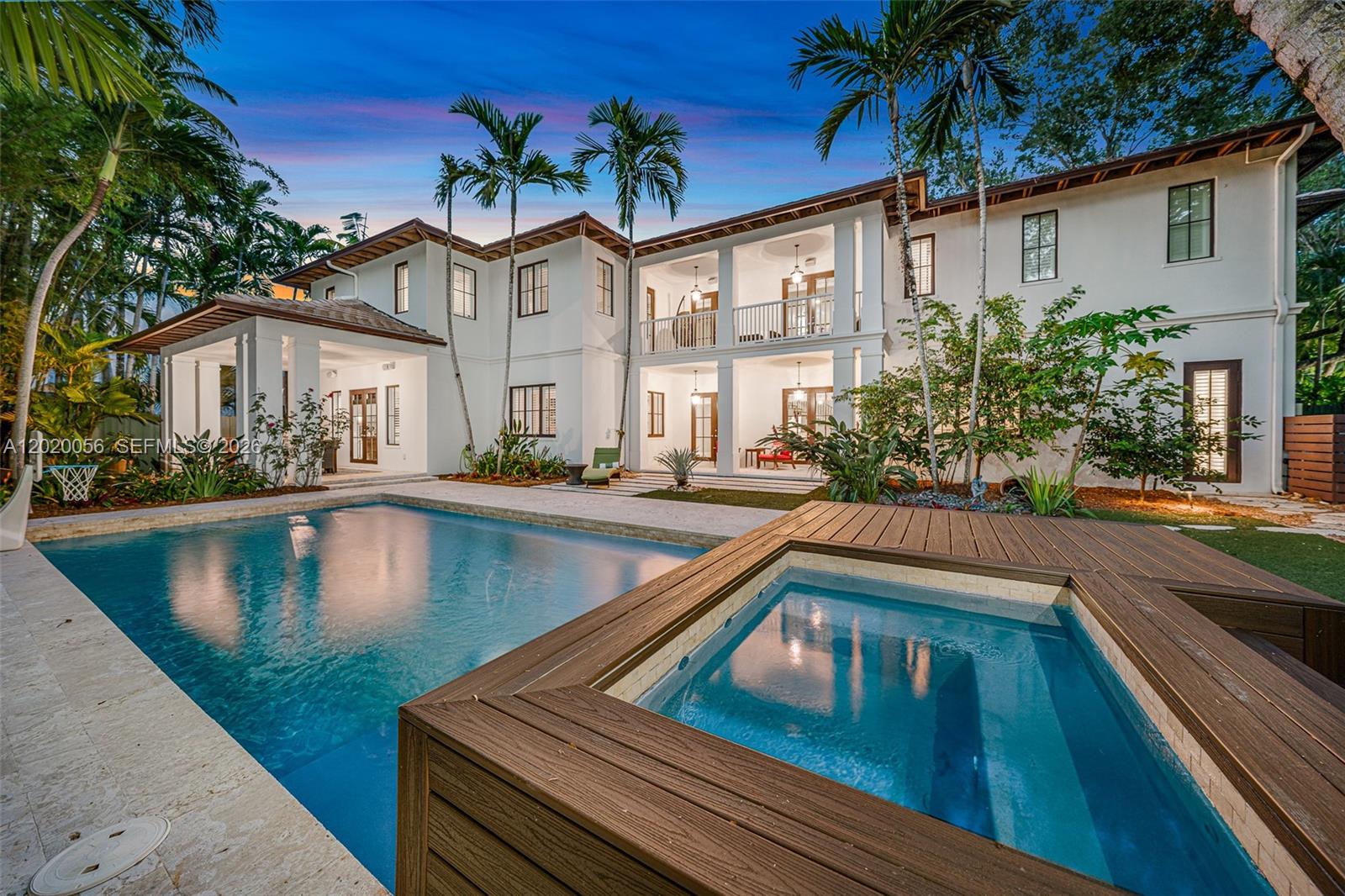 Nestled in the heart of coveted South Coconut Grove, this beautifully updated estate sits on an expansive 13,000 SF lushly landscaped lot and offers 5,825 SF under A/C of refined indoor-outdoor living. Featuring 6 bedrooms, 6.5 bathrooms, plus a dedicated office, this residence blends timeless elegance with modern comfort in one of Miami’s most walkable and desirable neighborhoods.

Designed for both entertaining and everyday living, the home showcases hardwood and coral stone flooring, high ceilings, movie theater, impact glass throughout, a stunning Italian Spagnol Cucine kitchen with granite countertops, Sub-Zero refrigeration, Viking gas range, Bosch dishwasher, wine cooler, and premium appliances throughout. The luxurious primary suite features a spa-inspired marble bath and electric fireplace.

Outdoor spaces are a true private retreat with mature tropical landscaping, summer kitchen, Artisan BBQ, saltwater pool and spa, pool heater, outdoor fireplace, outdoor terrace, and multiple entertaining areas. Additional highlights include Sonos indoor speaker system, updated water heaters, irrigation system, and spacious living areas filled with natural light.

Ideally located just moments from the best of Coconut Grove, enjoy walking distance to parks, marinas, cafés, bike paths, tennis facilities, and some of Miami’s top public and private schools. A rare opportunity to own a move-in-ready South Grove residence that perfectly captures luxury, lifestyle, and location.