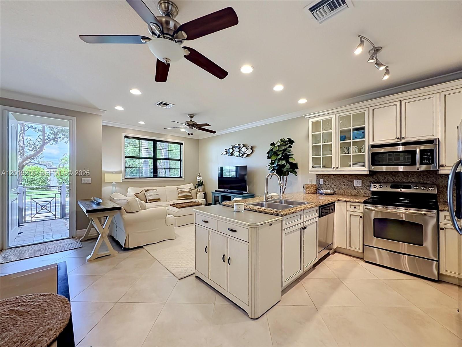 Rarely available turn-key townhouse located in highly desirable Pompano Beach! Steps from the beach in this beautifully appointed and updated 3 bedroom 2.5 bath 9’ ceiling townhome.
Nestled in the gated enclave Barefoot Beach Villas community on Ocean Boulevard. 
Parking includes a 2 car private garage, guest spots within the community and street parking.
Courtyard is a shaded oasis surrounded by mature palms.
Owner added  pull-down stairs to provide easy access to the floored attic and enhances your home’s storage capability.

Barefoot Beach Villas is distinguished as a low turnover community with lush vegetation, heated pool with tropical vibe chickee hut, and relatively low HOA fees for the area.
Two luxury developments, Waldorf Astoria and Ritz Carlton Residences, are under development just down the street.
Located in the heart of Pompano Beach’s vibrant dining, live music and cafe scene. Walk to all of your local favorites.

Whether you’re looking for a primary residence, investment income, or retreat, this townhouse had the lifestyle and location that is increasingly hard to find on the Florida coast.