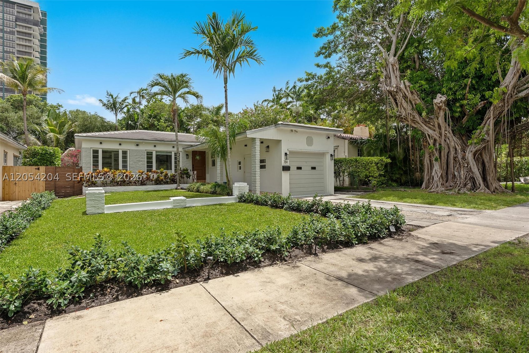 Nestled in the coveted Baywood neighborhood east of Biscayne Boulevard, this beautifully renovated Mid-Century home sits on a generous 6,250-square-foot lot just moments from the sparkling waters of Biscayne Bay. Offering 2 bedrooms, a den, and a versatile flex space ideal for a home office, gym, guest suite, or playroom, the home blends timeless charm with modern updates. Neighboring the prestigious Prescott Estates, where homes command prices up to $17.5 million, this is a rare opportunity to move right in, expand, or build your dream home in one of Miami’s most desirable neighborhoods. Just minutes from the Design District, Miami Beach, and world-class dining and shopping.