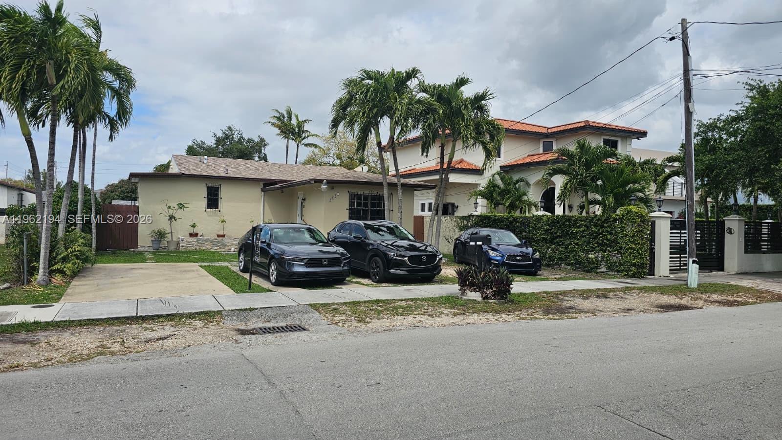 Located in the highly desirable Westchester area, this property sits on a nearly ¼-acre lot with zoning that allows for the construction of two homes—an excellent opportunity for investors, builders, or end users looking to expand. The existing home features a brand-new roof (less than a couple months) and a recently serviced septic system that has been cleaned and inspected. New plumbing throughout. One bedroom offers a private exterior entrance, ideal for extended family, guests, or rental income potential. The expansive lot includes multiple mature mango trees and ample space for future development, additions, or new construction. Endless possibilities in a prime Miami location close to major roads, shopping, and schools.