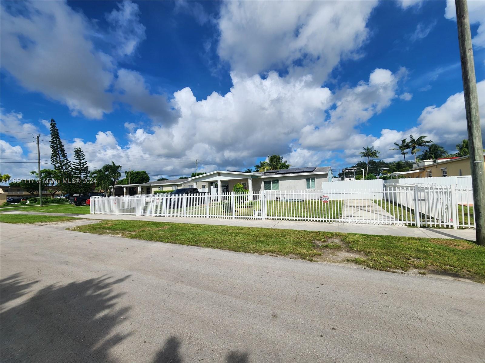 Great opportunity to own this spacious 4 room/2 bathroom home with pool, located on a huge lot that is rare in Miami Dade today! This property features solar panels, impact door, windows, security cameras, all new electrical wiring, smart lights, new plumbing, remodeled bathrooms, soft water system, and much more! The roof is new, the property is surrounded by beautiful metal fencing, the patio is lighted and has space for RV's and has hook up plumbing for RV's! The electrical panel has been replaced and has a tankless water heater. At the back of the property there is also space to enter with your boat, the lot is huge and well distributed. The best thing is no HOA!