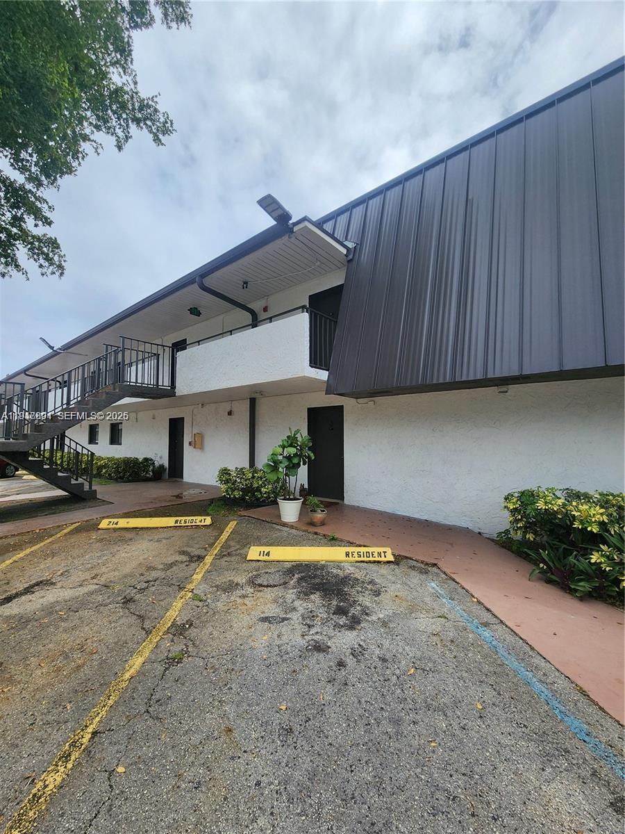 Move in with First Month and $1,000 Security Deposit! Unit featuring 2-bedrooms, 1-bath on the second floor of a quiet, well-maintained building with a new roof and impact windows for added comfort and peace of mind. The unit offers an open-concept living and dining area, a functional kitchen with plenty of closet space. Rent includes water and 2 assigned parking spaces. Shared laundry on-site. Community is Pet-friendly with a non-refundable $250 pet fee. Conveniently located in a well-connected residential area with access to schools, parks, shopping, and public transit. Additional 3rd parking spot available at $50 per month.