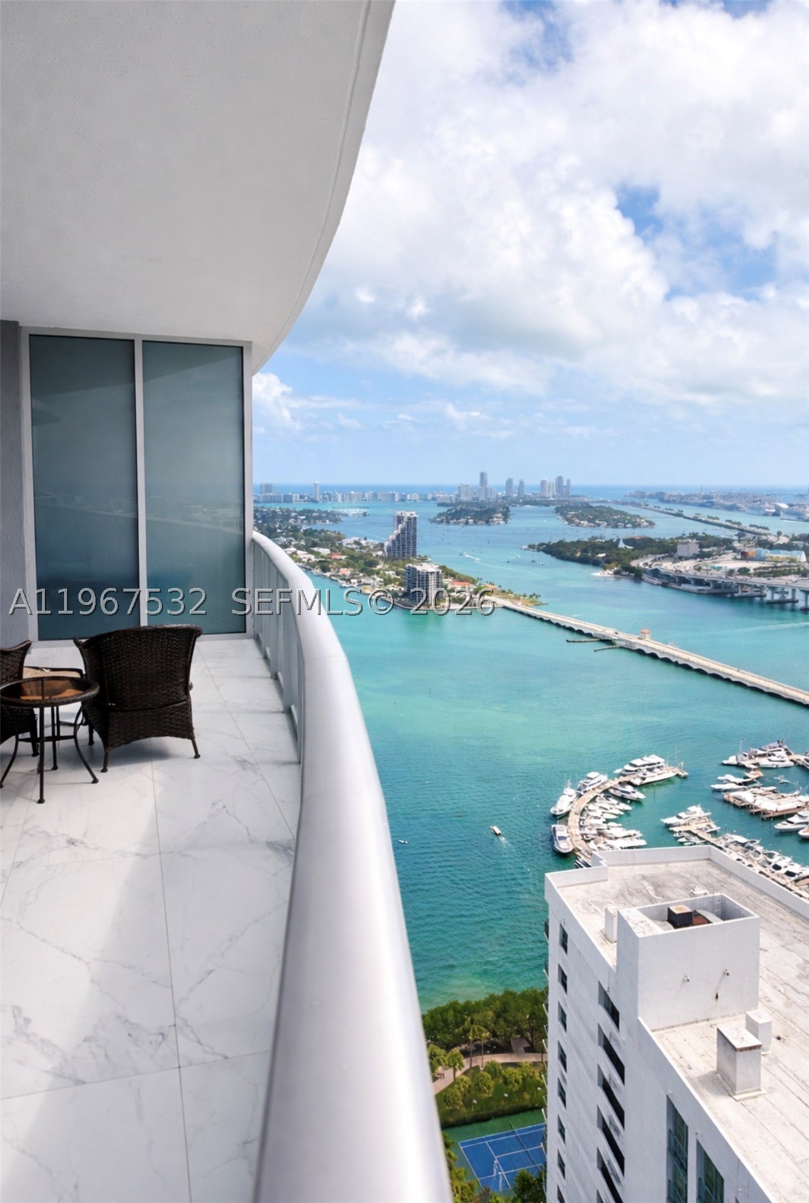 Centrally located in Miami's Arts & Entertainment District, Residence 4304 offers a spacious 1-bedroom, 1.5-bath layout with southern exposure and open views of Biscayne Bay and the Downtown Miami skyline. This well-appointed unit features tile flooring throughout the interior and balcony, custom drop ceiling with integrated ambient lighting, motorized blinds, quartz countertops, and Bosch stainless steel appliances. The primary bathroom includes an upgraded shower and soaking tub.
