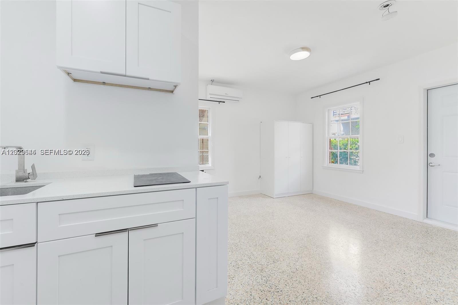 Modern studio unit in well-kept gated community in North Beach! This corner unit is furnished & has thoughtful features & layout, including a Murphy bed, which opens up the space when not in use. Newer appliances, wall air-conditioning system w/remote control, foldaway desk, wardrobe & modern bathroom has a fully tiled shower with glass doors. WI-FI, ELECTRICITY, water, trash services INCLUDED IN RENT!. Washer/dryer on site. This charming complex also includes relaxation areas for residents for grilling, hammocks and tables for dining/working outdoors. Walking distance to the beach, Publix & a multitude of restaurants right at your fingertips. Outstanding Value! 
*(Landlord requires a minimum credit score of 700 for all applicants)*