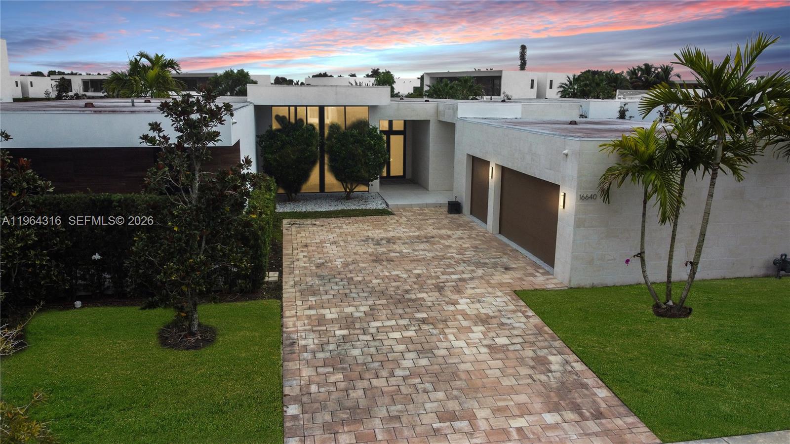 Welcome to this stunning modern lakefront residence located in the prestigious gated community of Botaniko Estates in Weston. Built in 2020, this luxury home offers 6 spacious bedrooms, 7.5 bathrooms, and over 4,800 square feet of elegant living space. The gourmet kitchen features high-end appliances and a gas cooktop, perfect for cooking enthusiasts. Enjoy an open-concept layout, private media room, and breathtaking lake views throughout the home. Additional highlights include a 3-car garage, beautifully landscaped grounds, and access to Weston’s top-rated schools and amenities. Experience contemporary luxury living at its finest in this exceptional property.