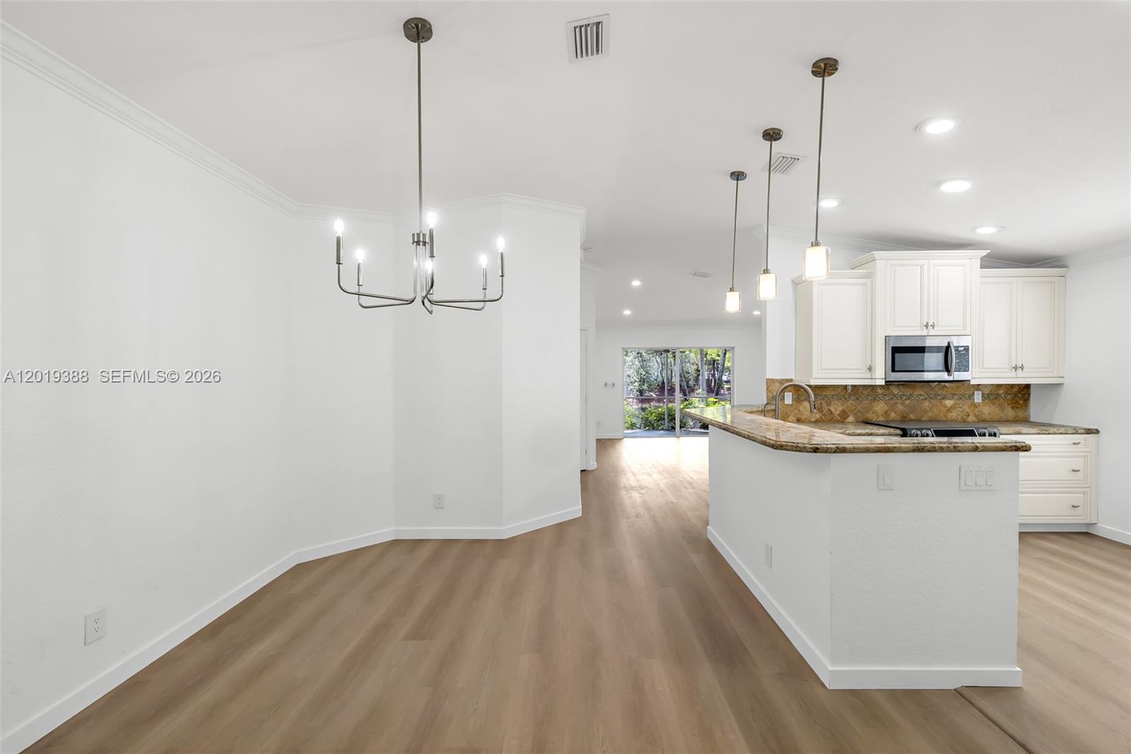 Rare Corner-Unit Villa with Serene Canal Views in Gated Addison Court!

Experience the perfect blend of modern elegance and waterfront tranquility in this stunning 3-bedroom, 2-bathroom corner-unit villa. Nestled within the secure, gated enclave of Addison Court, this residence offers a bright, airy atmosphere characterized by soaring vaulted ceilings and an abundance of natural sunlight.

Step across brand-new flooring that flows seamlessly throughout the home, leading you to a spacious, open-concept living area with picturesque views of the canal. The heart of the home features a contemporary kitchen equipped with updated appliances and generous counter space, ideal for both everyday living and entertaining. Both the primary suite and guest bedrooms have been enhanced with modern updates, providing a fresh and sophisticated feel in every room.

Unbeatable Location:


Education: Minutes away from top-tier, A-rated schools.


Convenience: Ideally located near premier shopping, dining, and major thoroughfares, including the Sawgrass Expressway, for an effortless commute.

This corner-unit villa represents a premier opportunity for move-in-ready living in one of Coral Springs' most convenient locations.