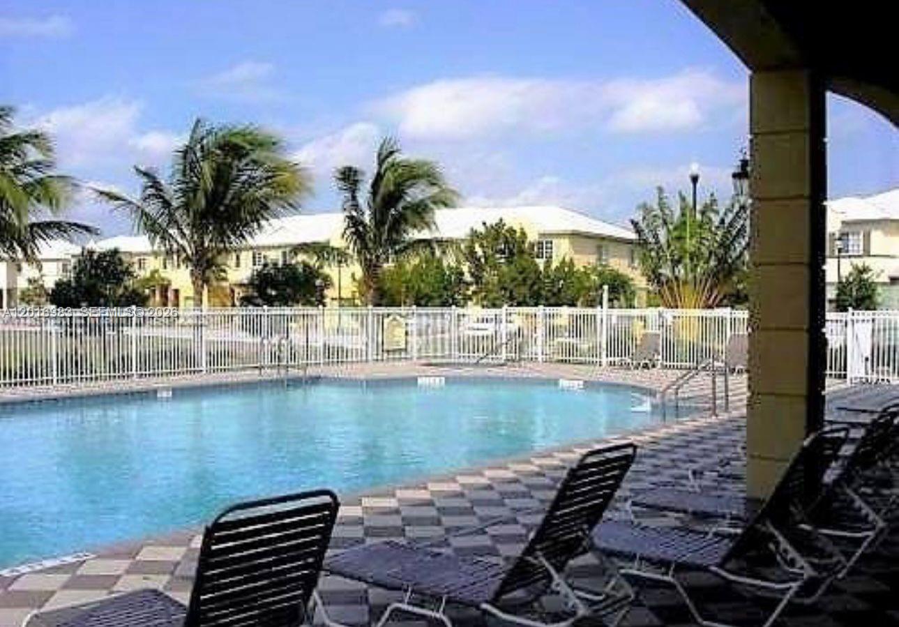 Nice condo with 2 beds/2 baths located in the gated community of March Harbour in Riviera Beach, just 5 minutes from the beach. Nice size dining and living room and kitchen with storage. Full-size washer & dryer inside the unit. Features ceramic tile floors in the living areas and bathrooms and  laminate floors in the bedrooms.The A/C and heater are approximately 2 years old. 2 assigned parking spaces conveniently located directly in front of the unit plus guest parking. This community offers a swimming pool to enjoy with friends and family, exercise room, child play area, tennis courts and more! Located close to everything including shopping, restaurants, and highways. Excellent access to I-95. Available June 19. Very easy to show. Make this your home today!